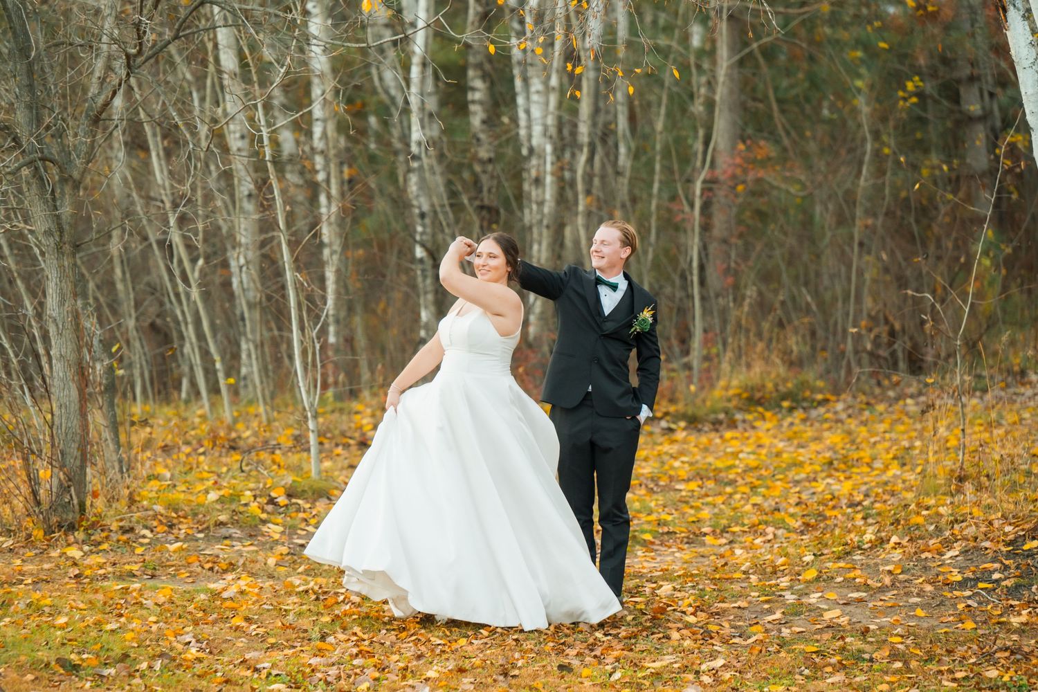 A romantic autumn wedding photo sequence with fallen leaves and birch trees creating a natural backdrop.