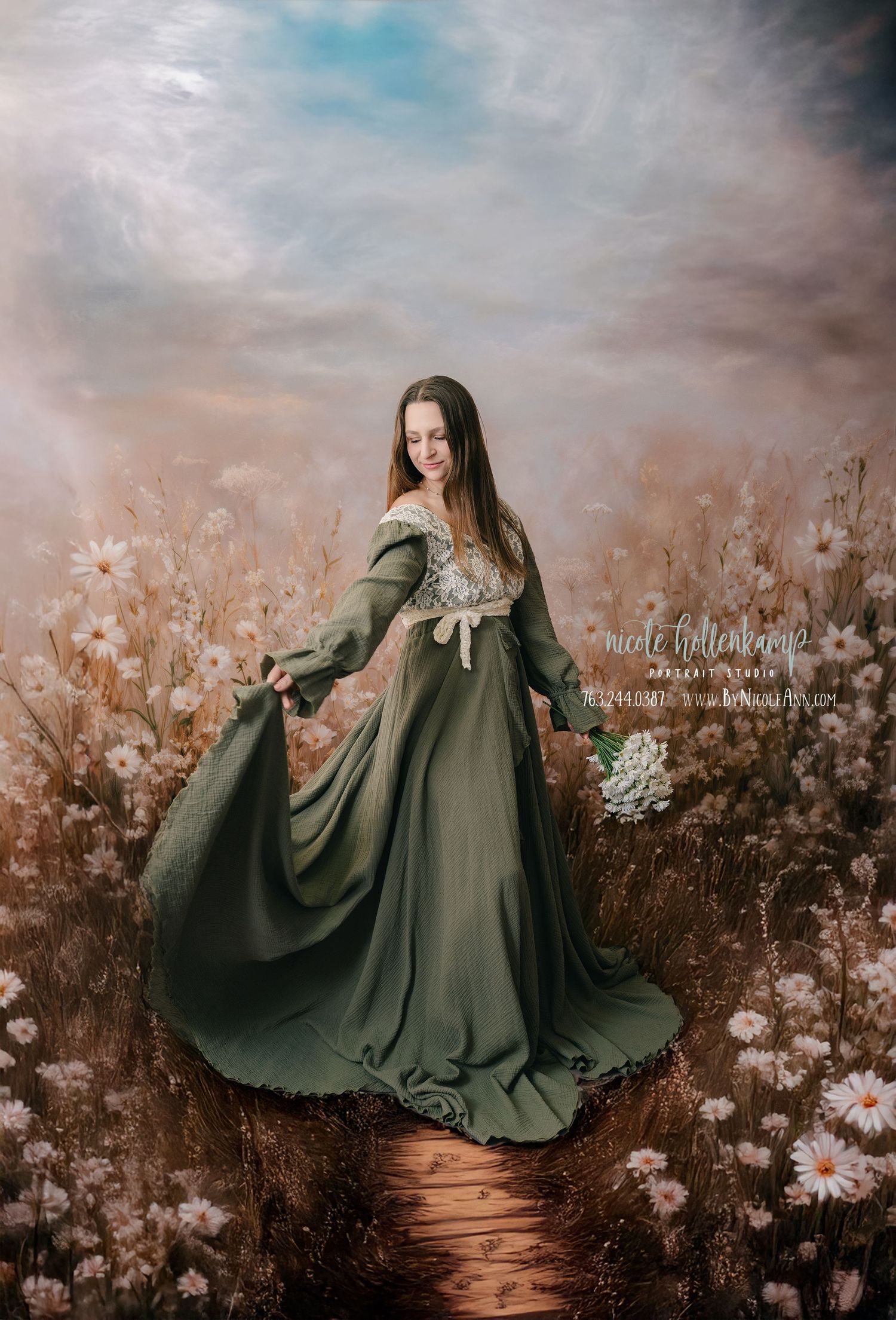A flowing green dress twirls gracefully in a dreamy outdoor setting with delicate white wildflowers in the background.