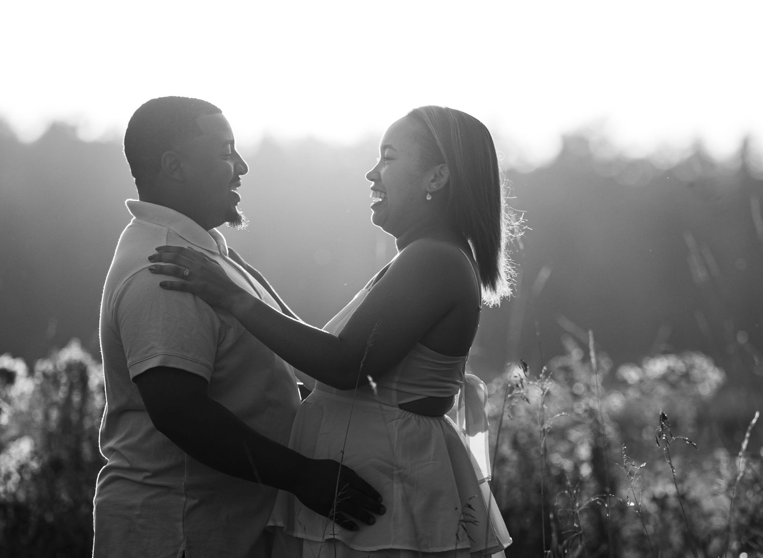 A black and white photo series showing silhouettes of people dancing together in an outdoor setting.