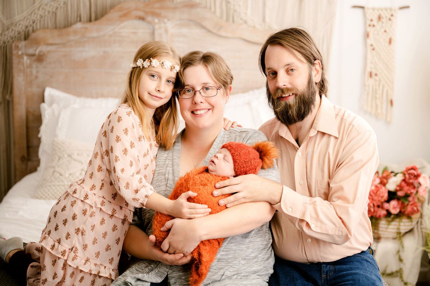 A tender family moment is captured in a series of intimate photos on a light-colored background with warm tones.