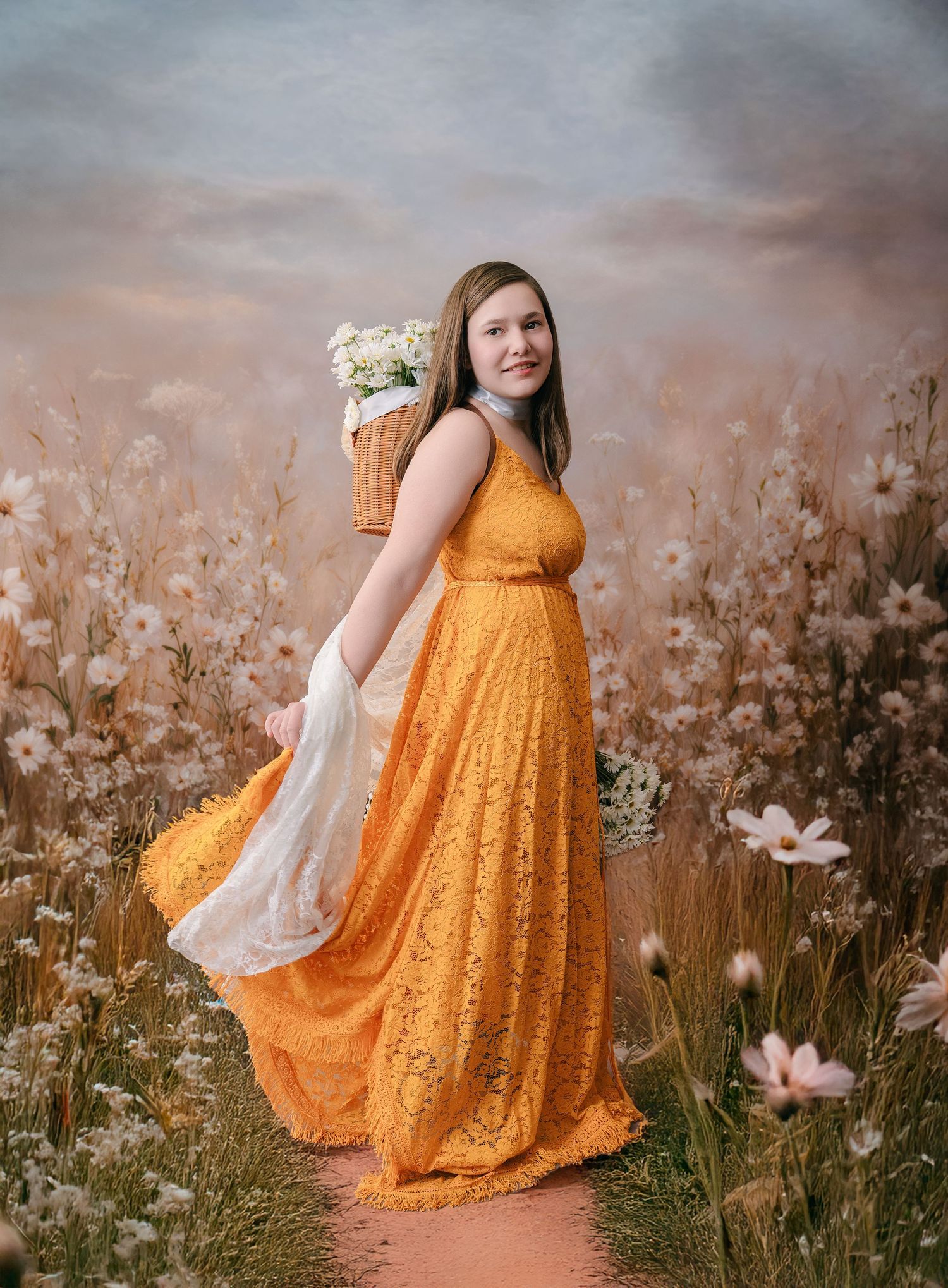 A person in a flowing yellow lace dress stands in a dreamy meadow with wildflowers at sunset.