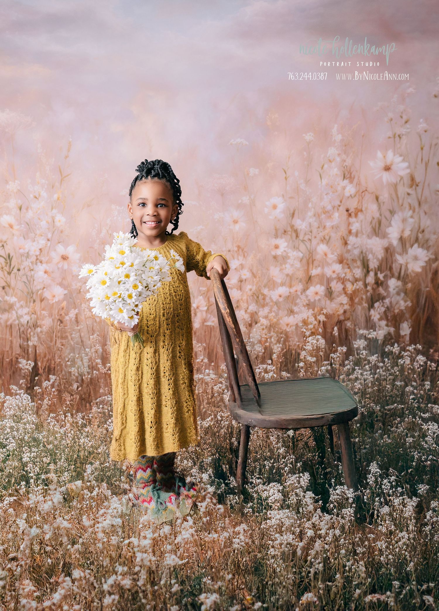 Young girl in yellow dress holding white daisies beside wooden chair in flower field portrait. mother day photoshoot
