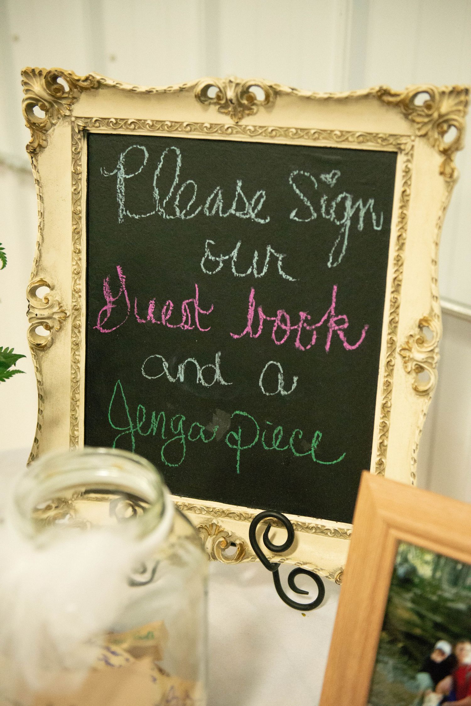 Decorative framed chalkboards display handwritten messages at a wedding reception. Zimmerman MN Weddings