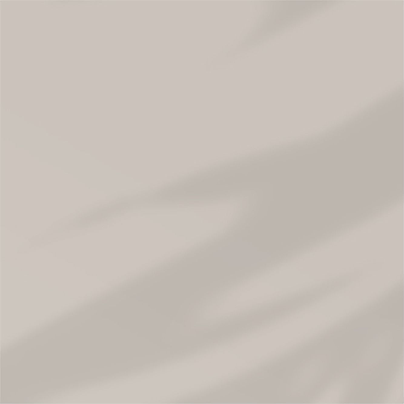 Abstract soft beige background with gentle shadow patterns.