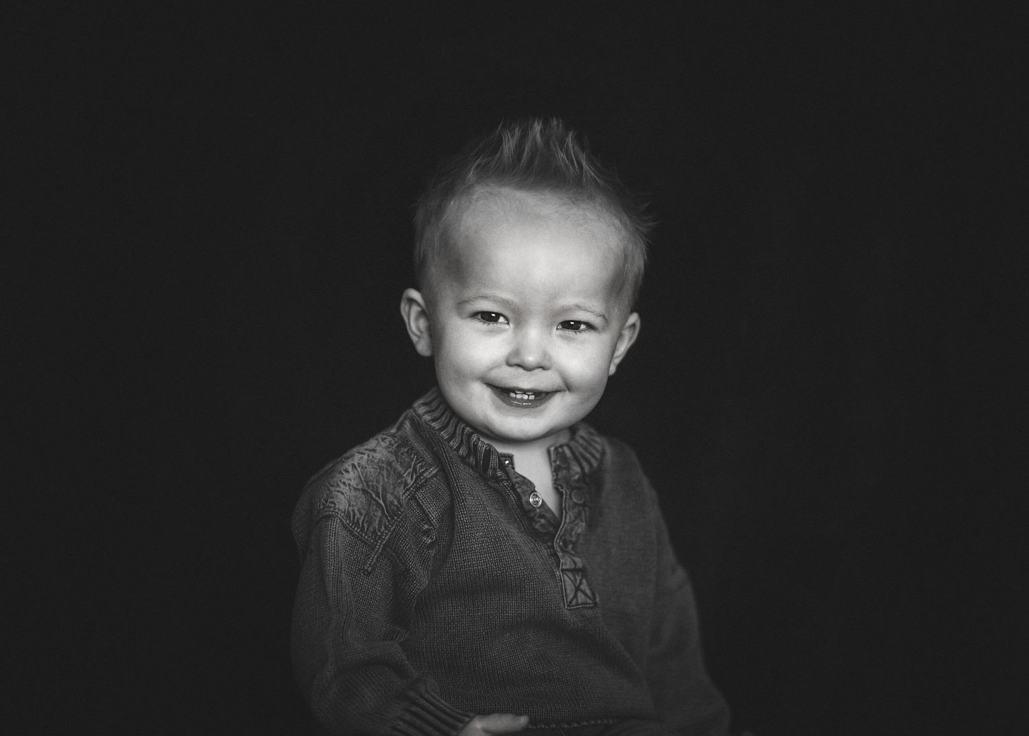 Black and white portrait of toddler in studio