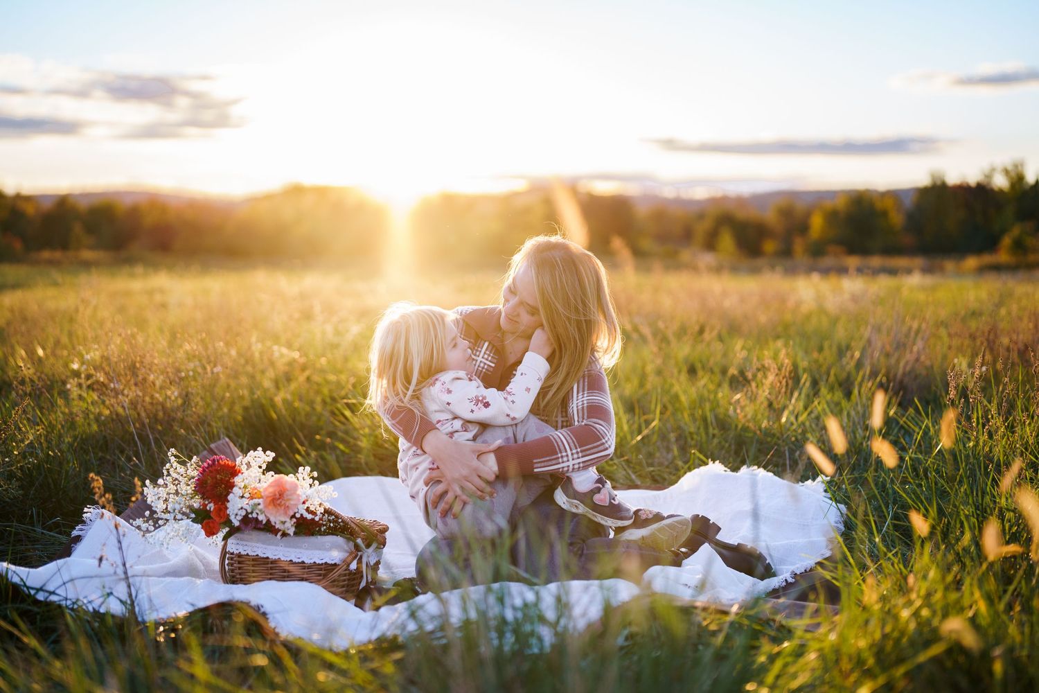 Natural light family session at golden hour in a field near Frederick, Maryland