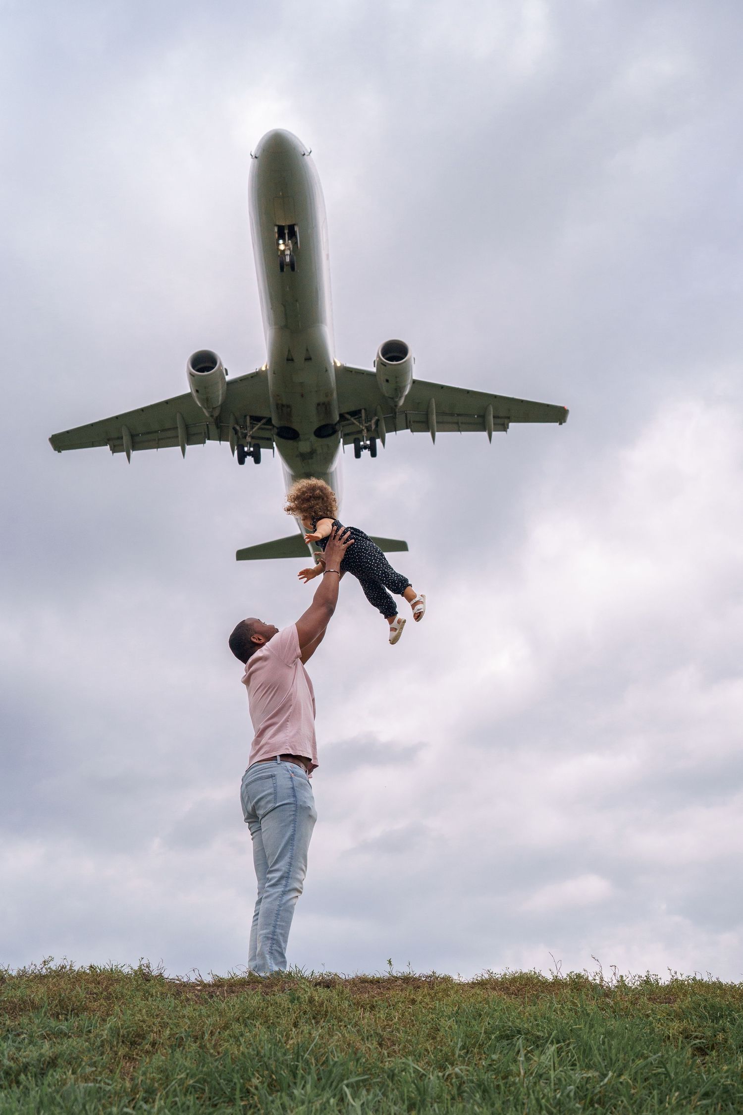 Dad and daughter playing together at Gravelly Point in Washington DC