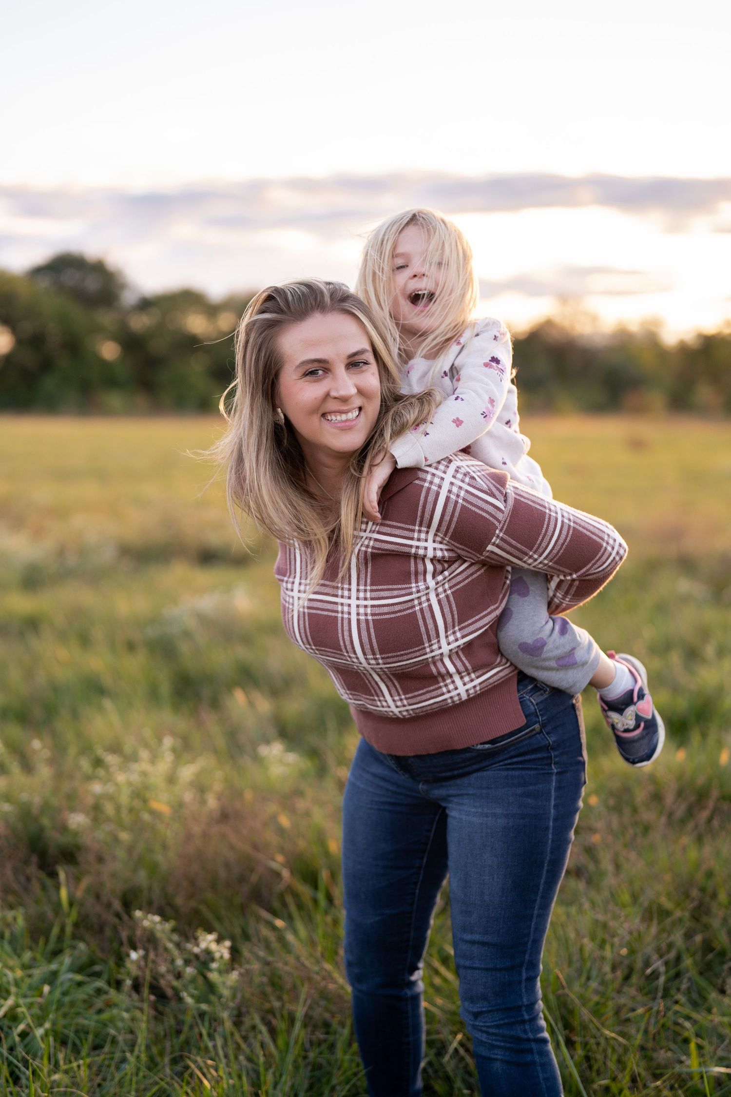 Natural light family session at golden hour in a field near Frederick, Maryland