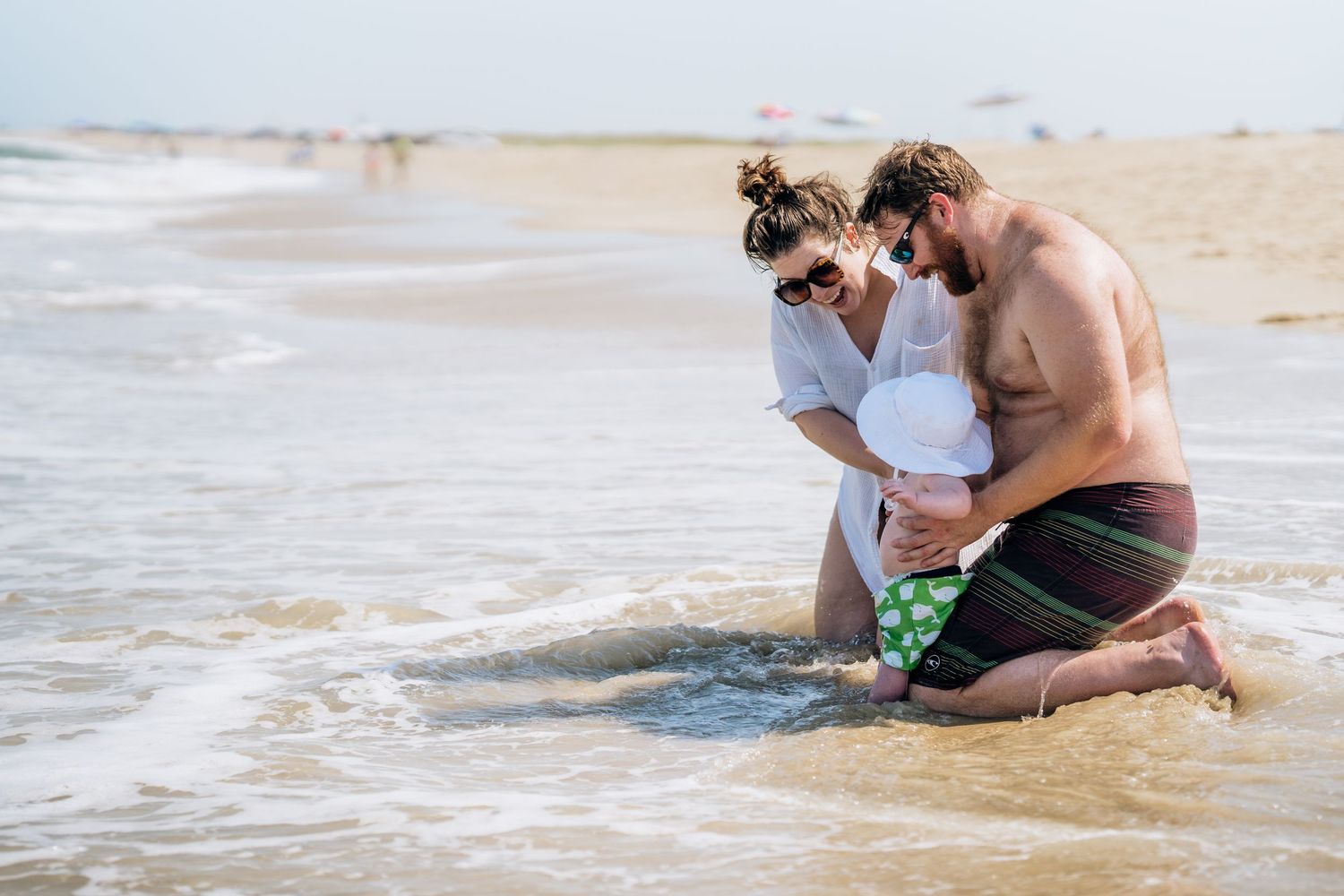 family session at the beach in Delaware with their baby