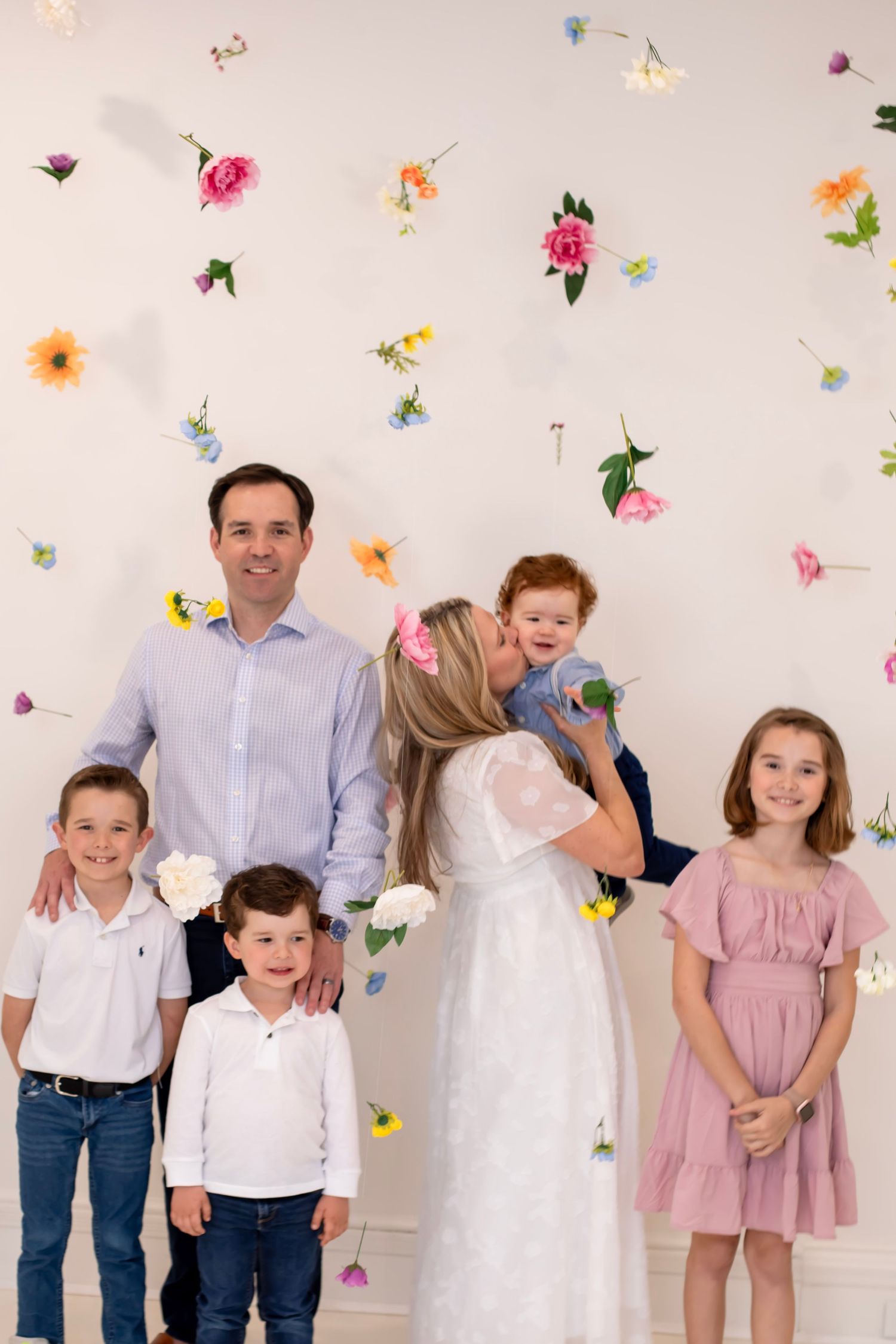 Spring large family studio portrait in Cincinnati with floral accents capturing high-end, elegant family portraits for premium