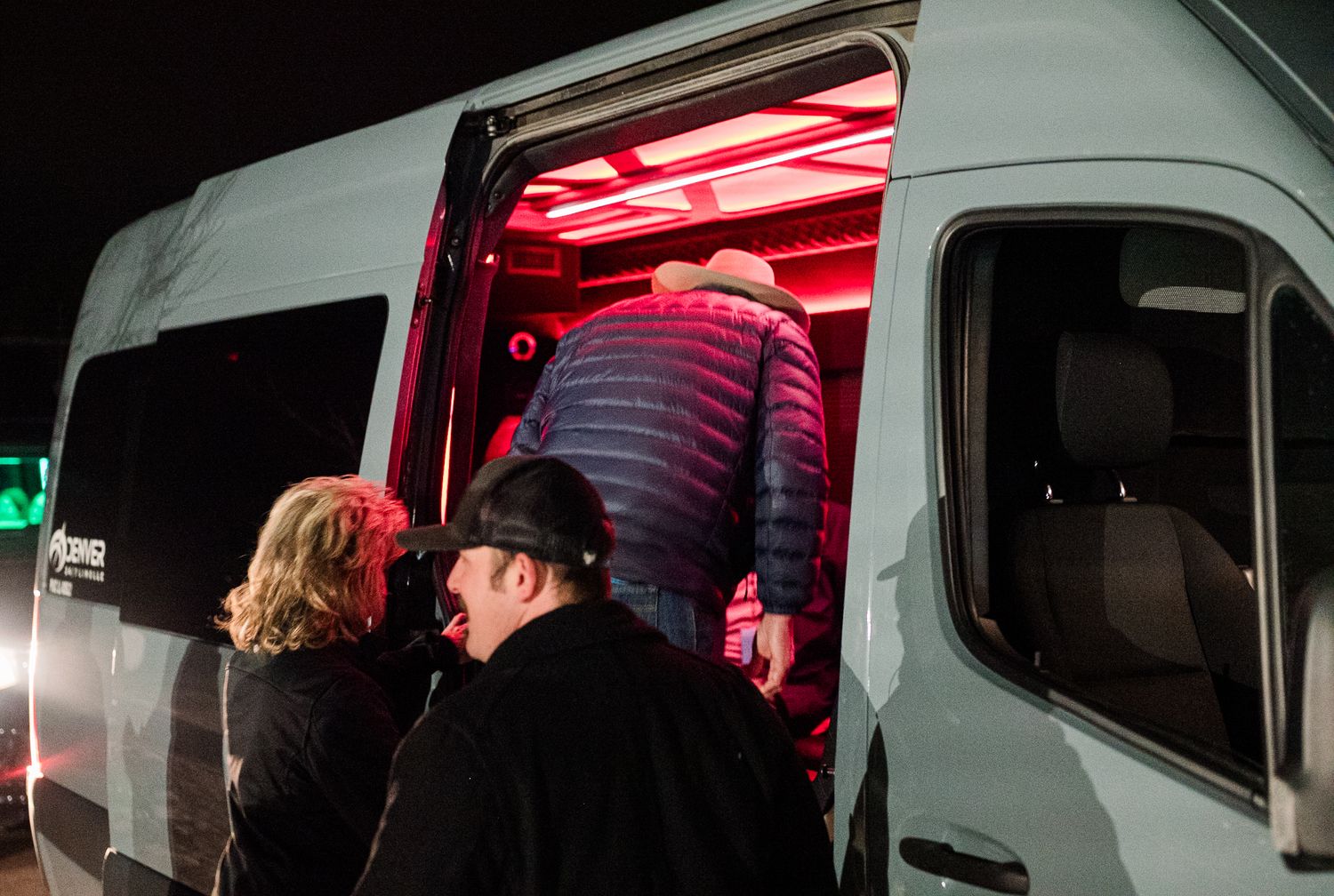 Guests smiling and enjoying a Night to Shine event in Colorado, captured in candid event photography highlighting connection and joyful mome