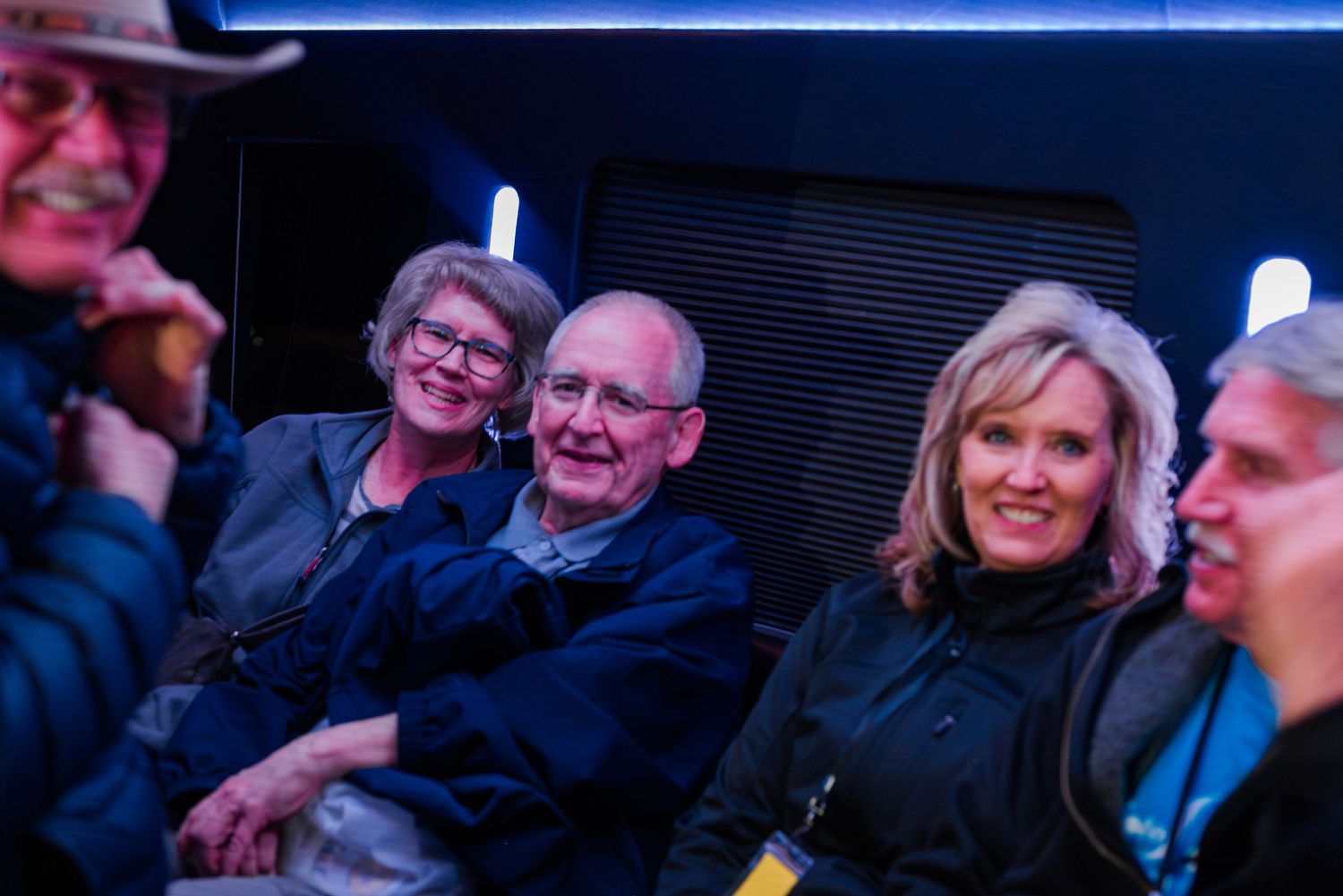 Guests smiling and enjoying a Night to Shine event in Colorado, captured in candid event photography highlighting connection and joyful mome