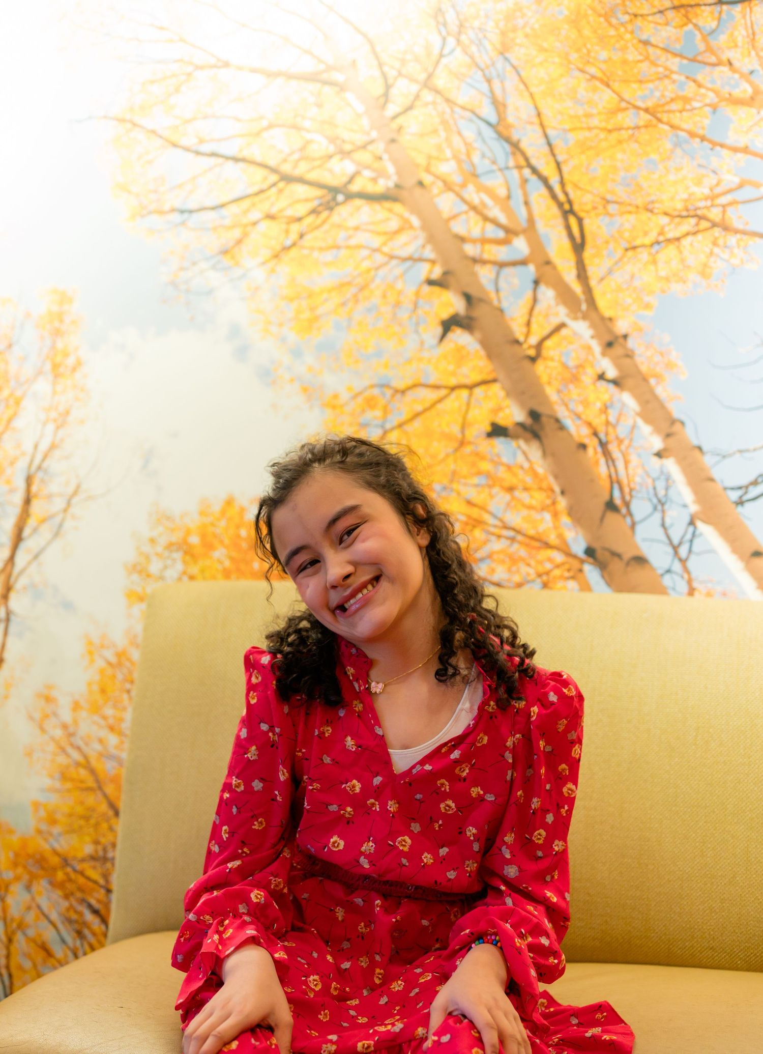 Portrait of smiling girl in red dress, candid Colorado event photography, natural light Denver photographer