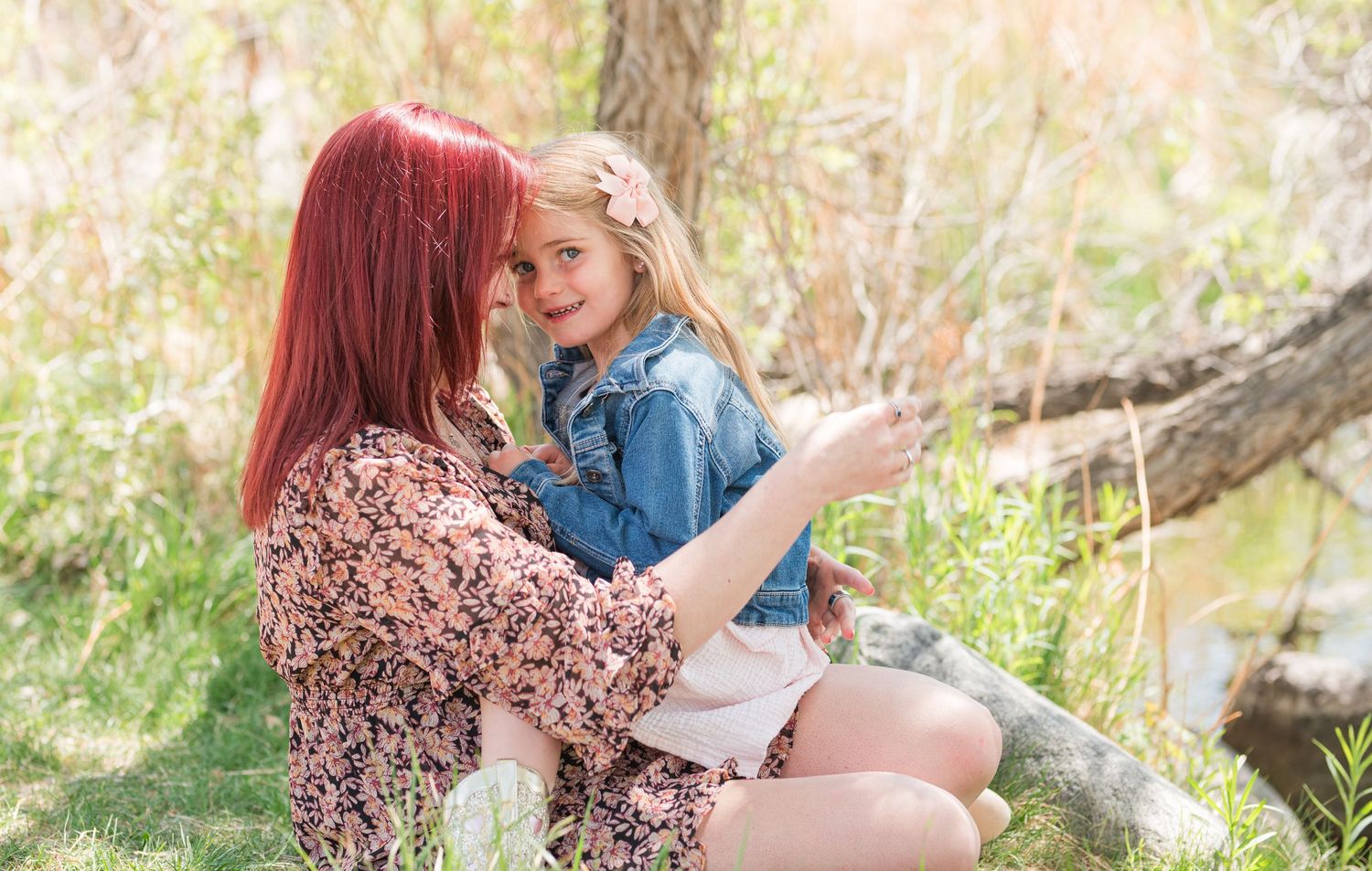 Mommy and me photo of mother kissing daughter, candid Colorado family photography, natural light Denver photographer