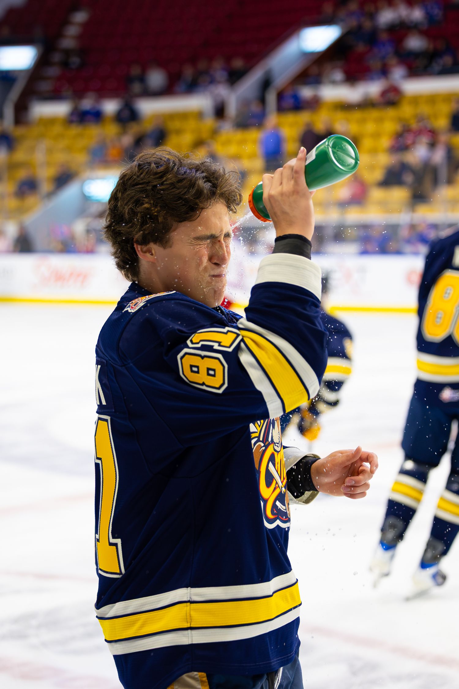 Evan Headrick of the Erie Otters spraying water during on ice warmup prior to an OHL hockey game.