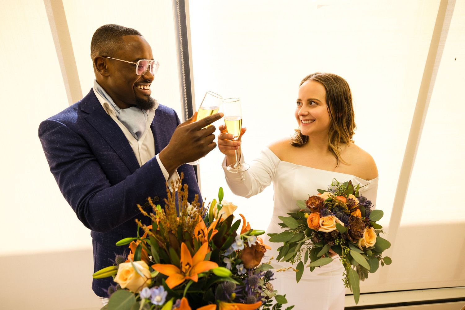 Wedding celebration candid moments with guests and floral decorations.