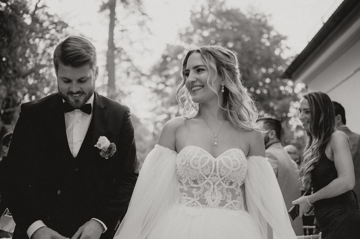 Wedding ceremony photo series showing emotional moments in black and white.