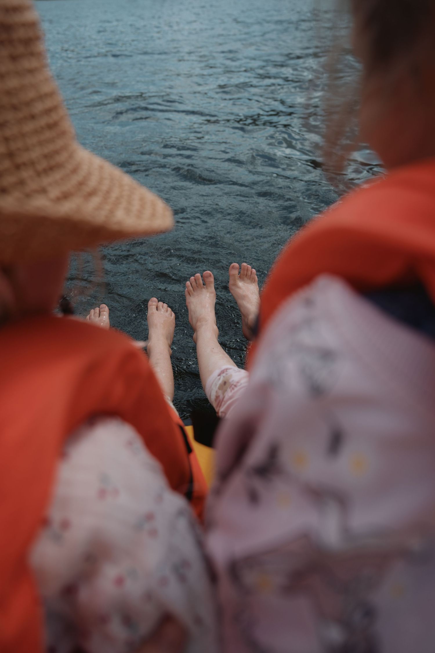 Barefoot moments by the lake – children dipping toes and giggling under the summer sun in the Midlands.