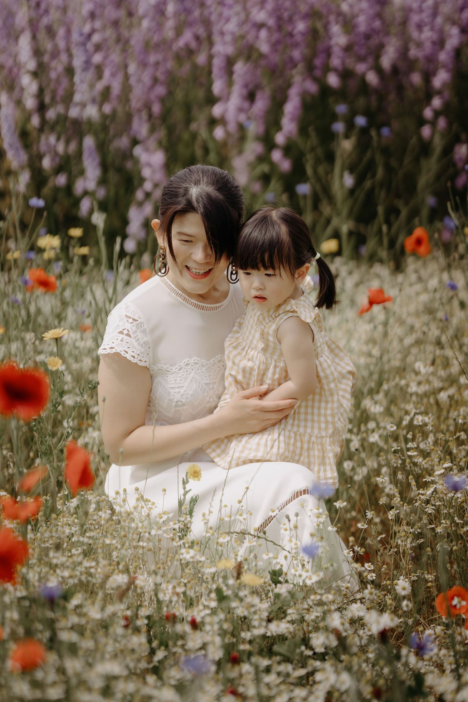 Family session at The Real Flower Petal Confetti Field - family in the delphinium field
