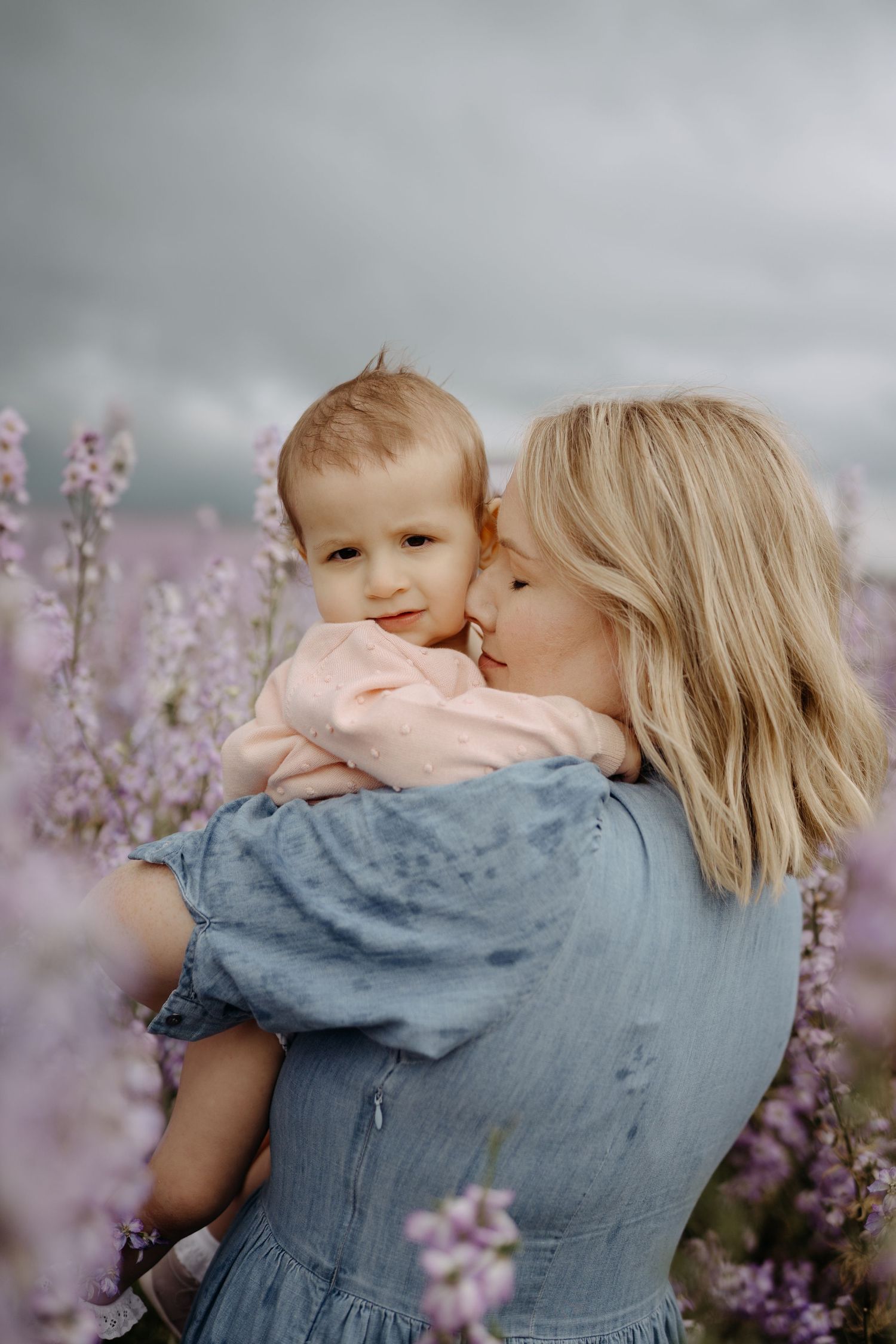 mum and daughter hugging in a confetti flower field Shropshire Petals
