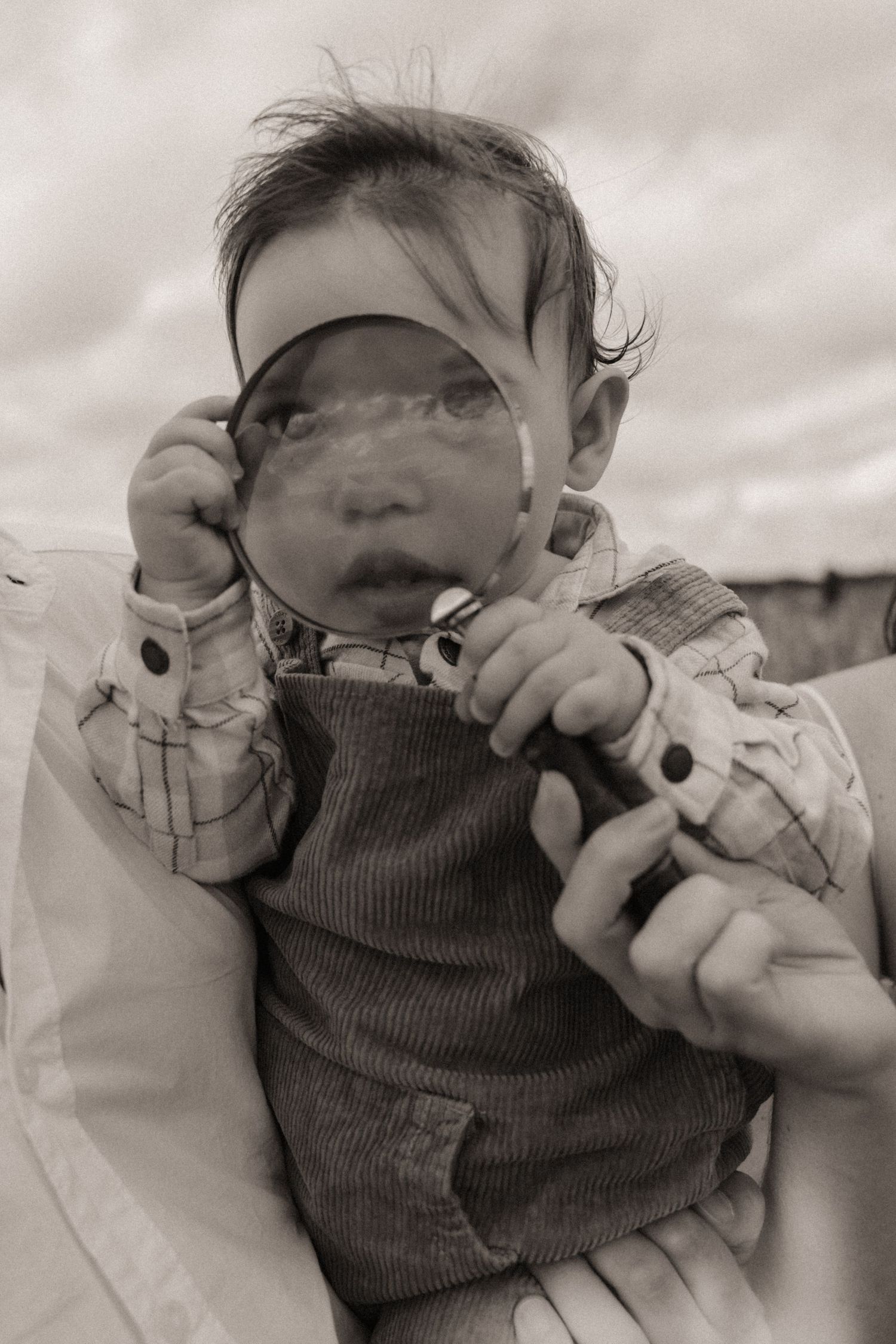 Seeing the world through glass, shapes bending and softening in a moment of playful exploration.