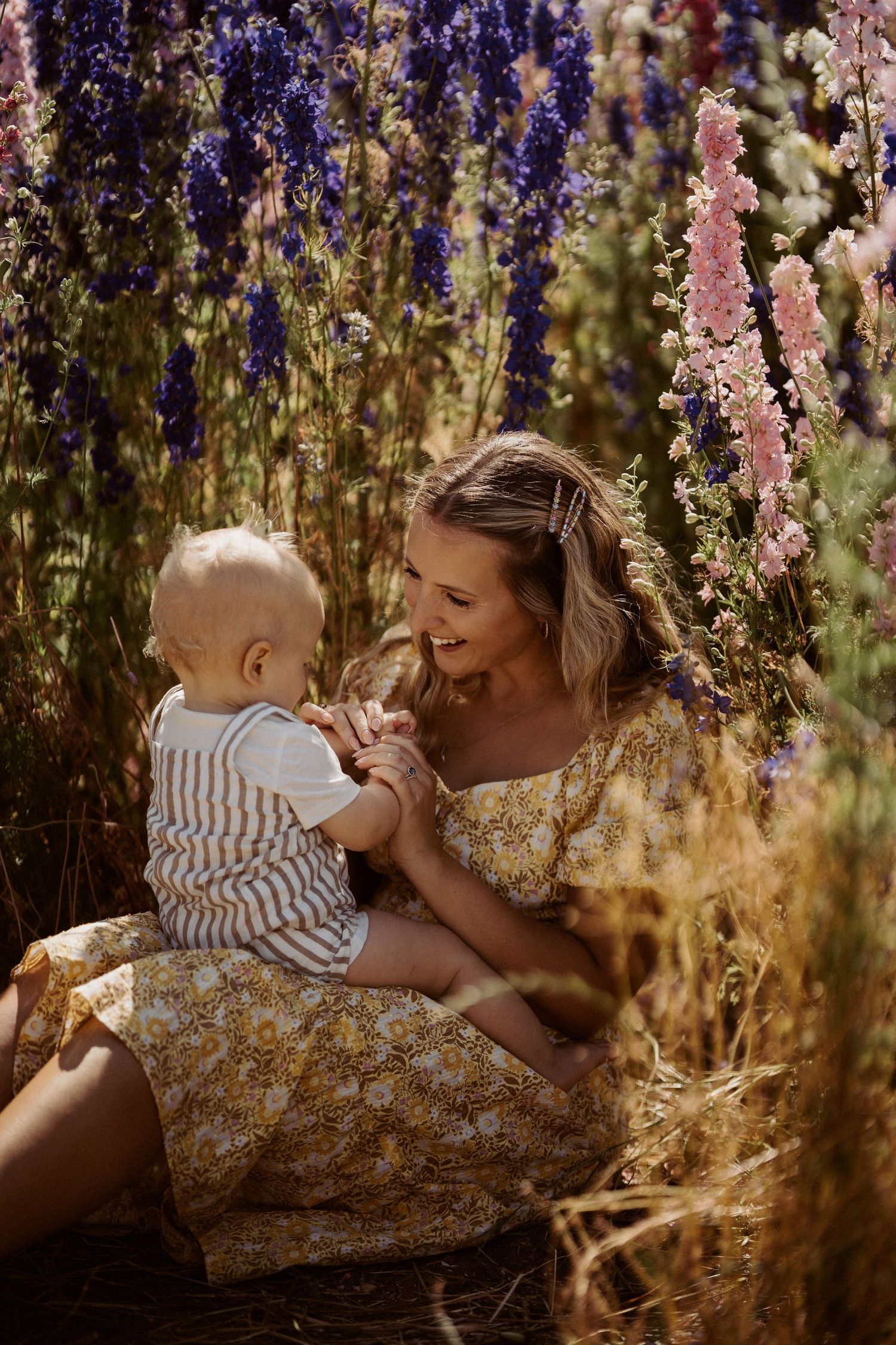 Family session at Shropshire Petals Field - family in the delphinium field