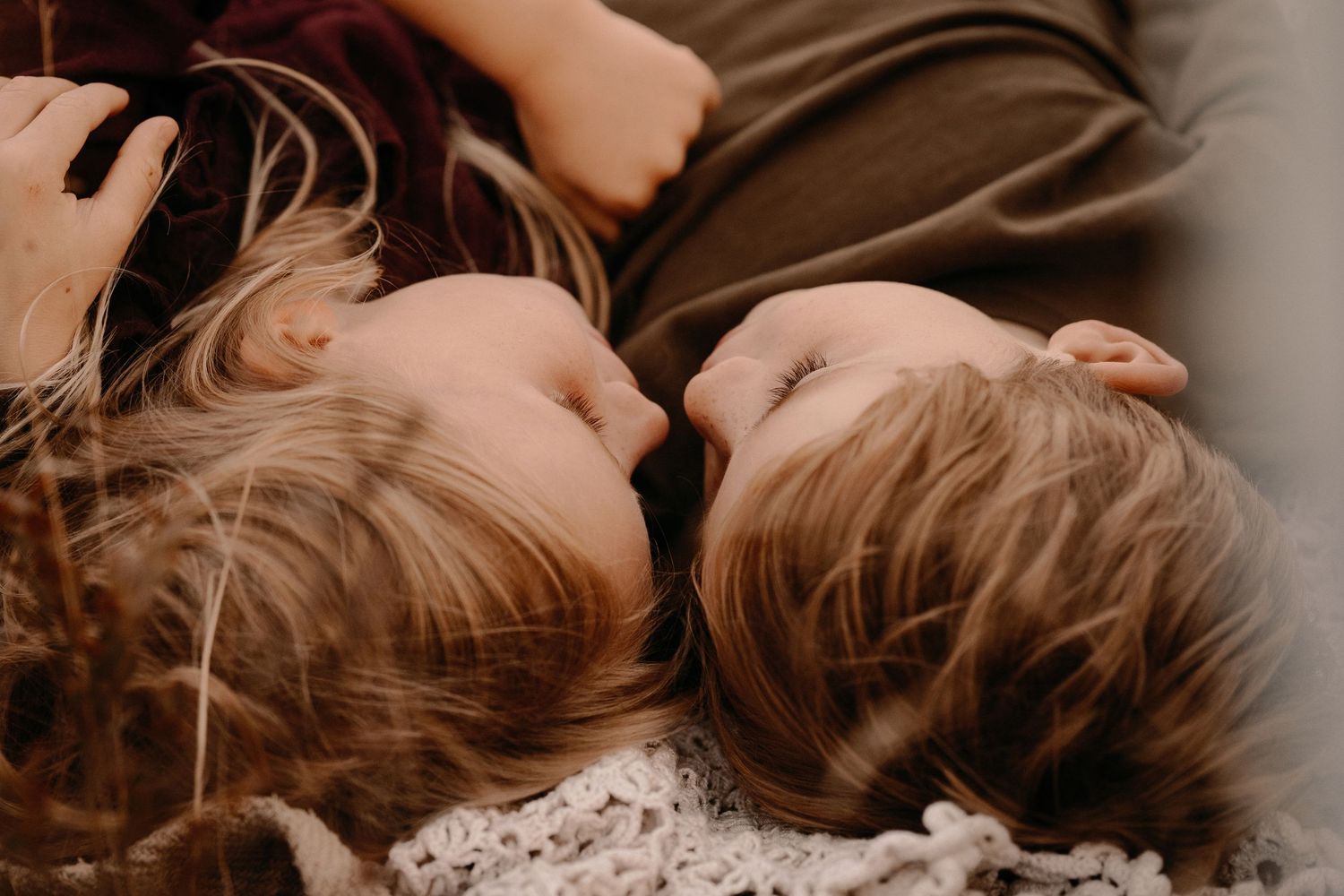 Siblings sharing a quiet, heart-to-heart moment – storytelling family photography in Swadlincote.