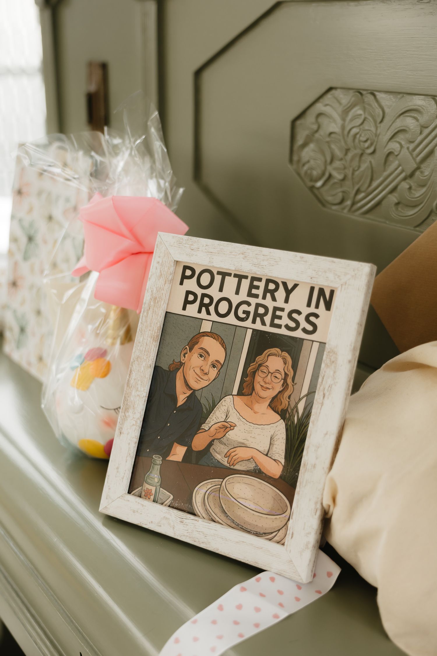 A series of polaroid-style photos showing pottery making progress displayed on a light colored surface.