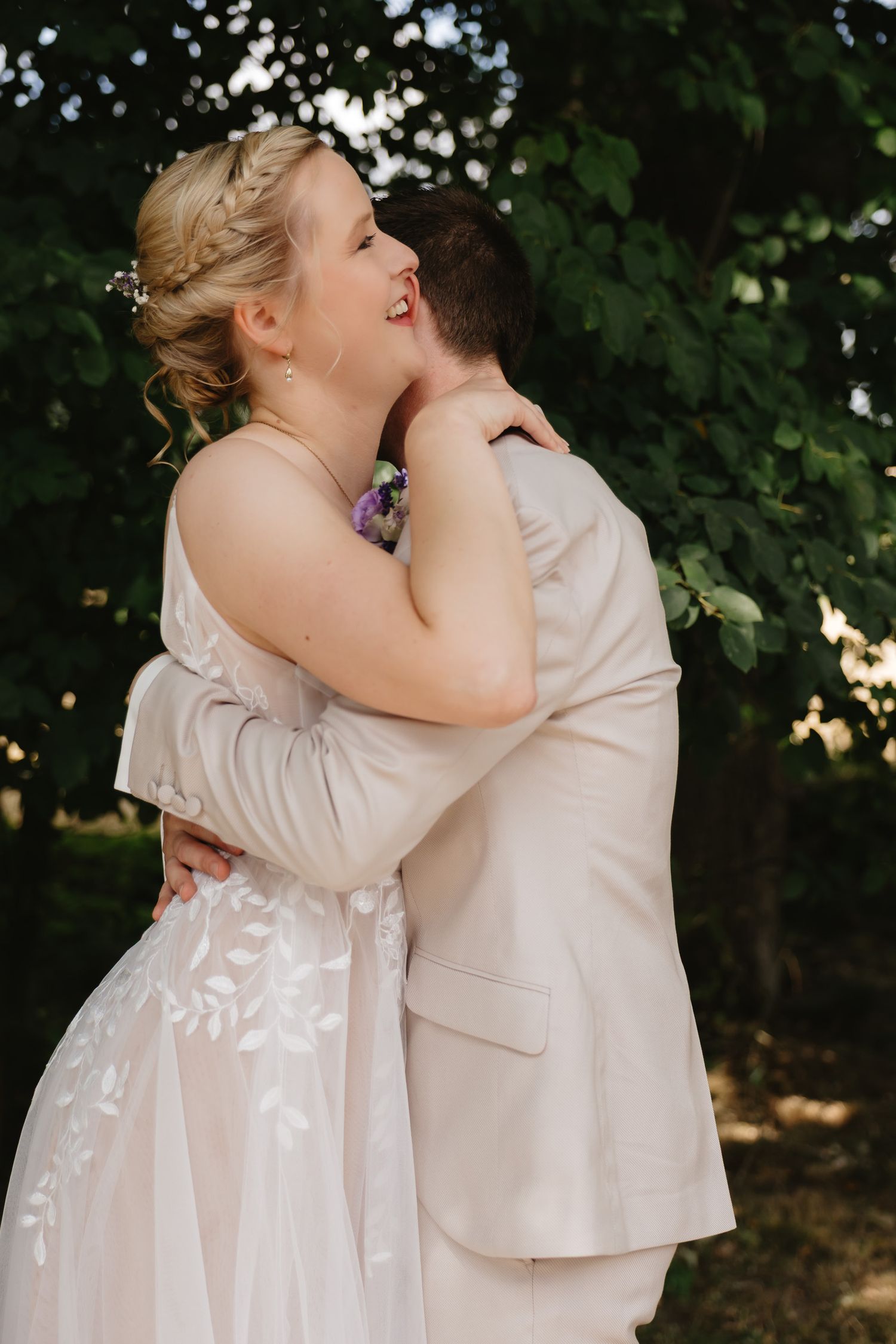 Romantic outdoor wedding moment captured in sequence showing a couple embracing in a natural garden setting.