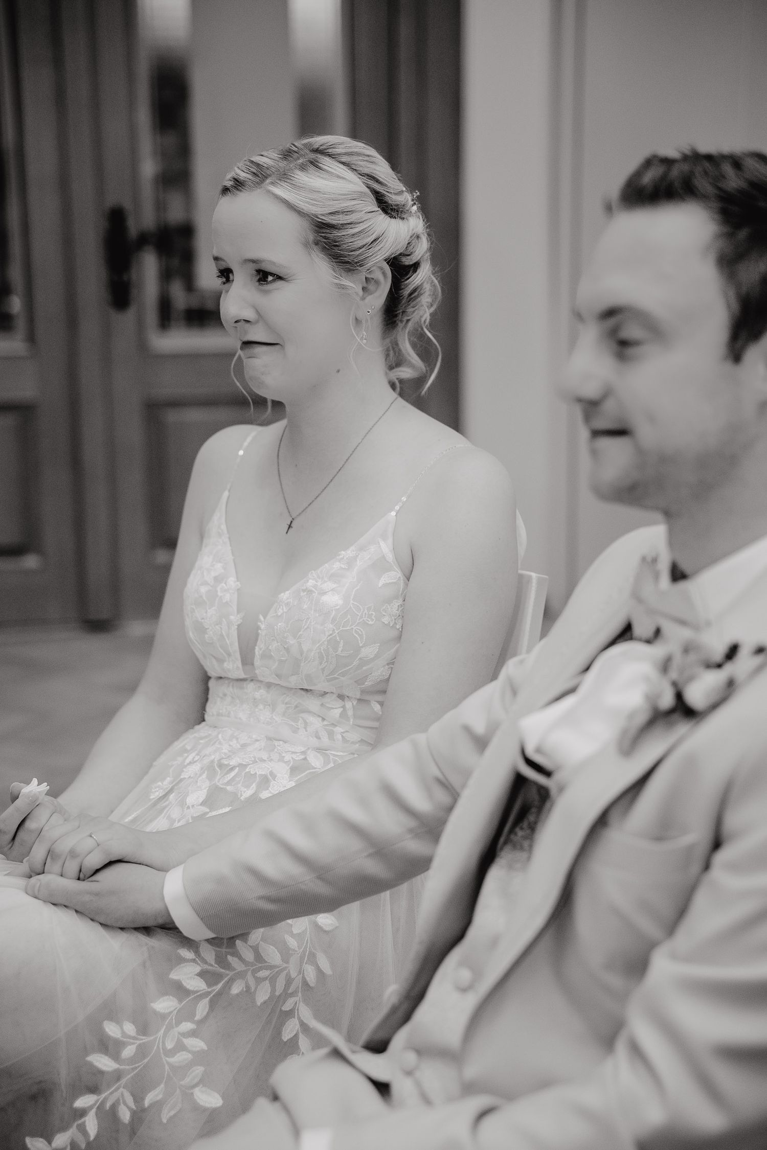 Black and white photo sequence showing a couple seated together during what appears to be a wedding reception.