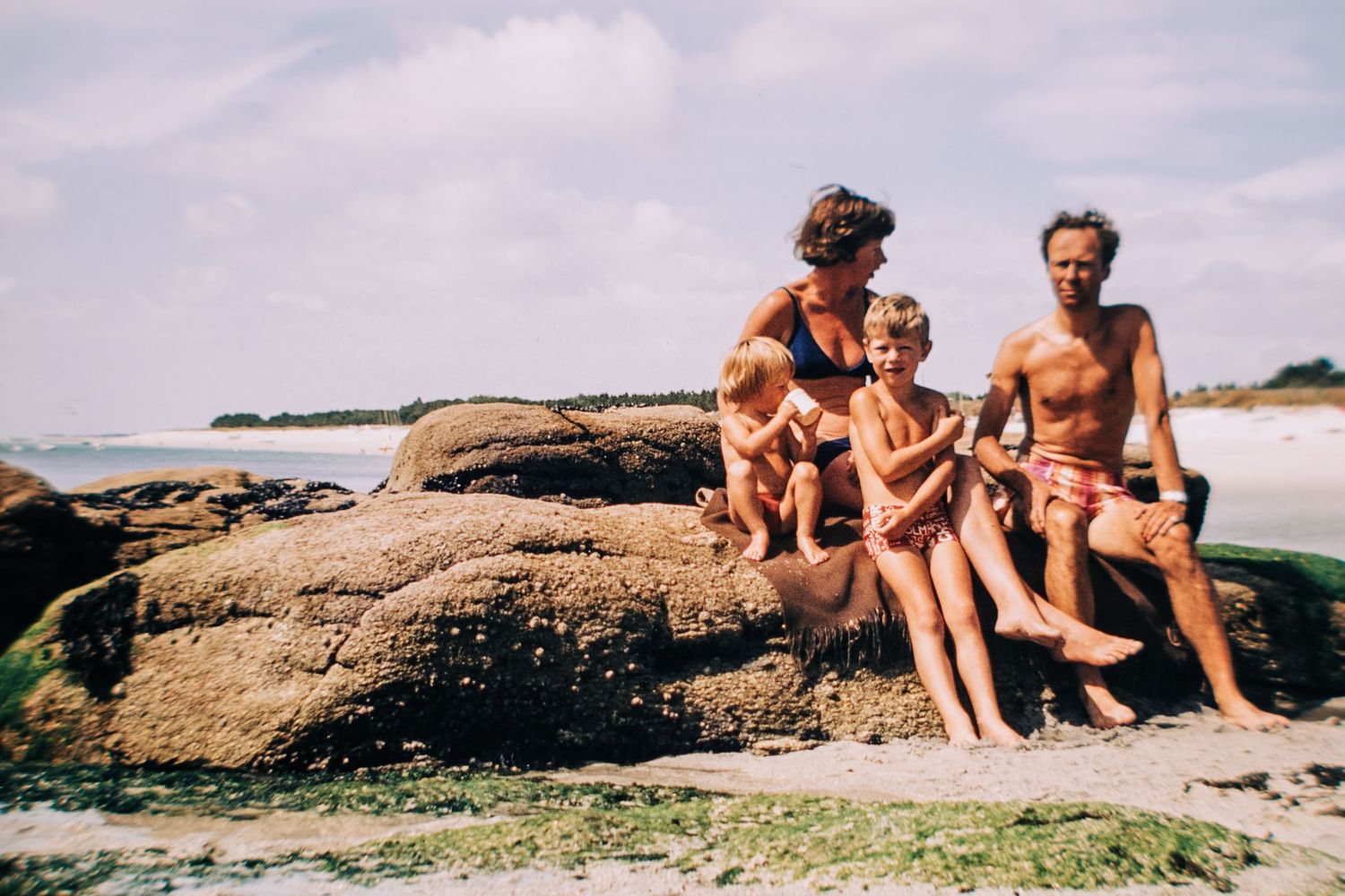 Cat aged three with her family during a seaside holiday in the south of England