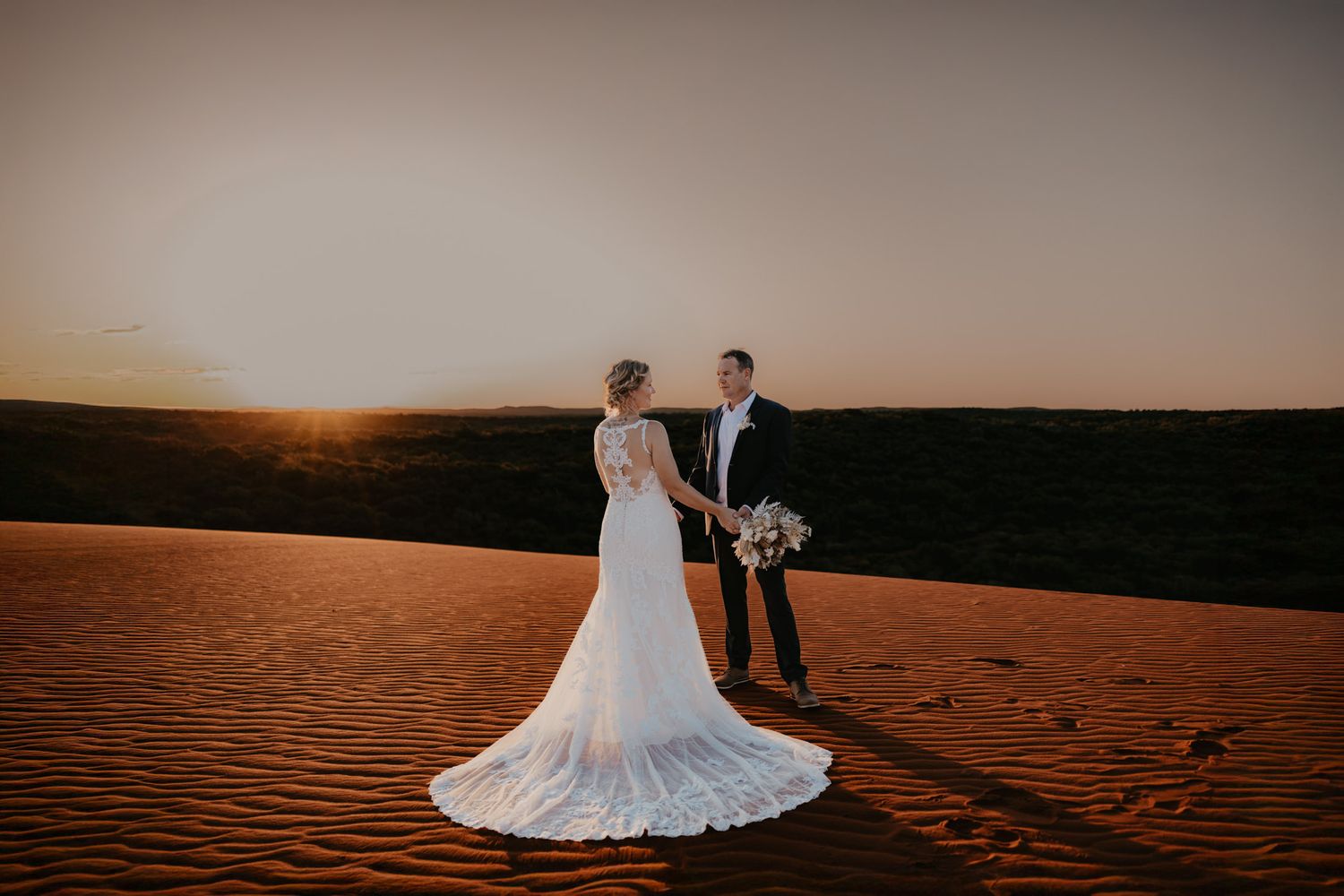 bride and groom wedding portrait red pindan dunes Exmouth, WA