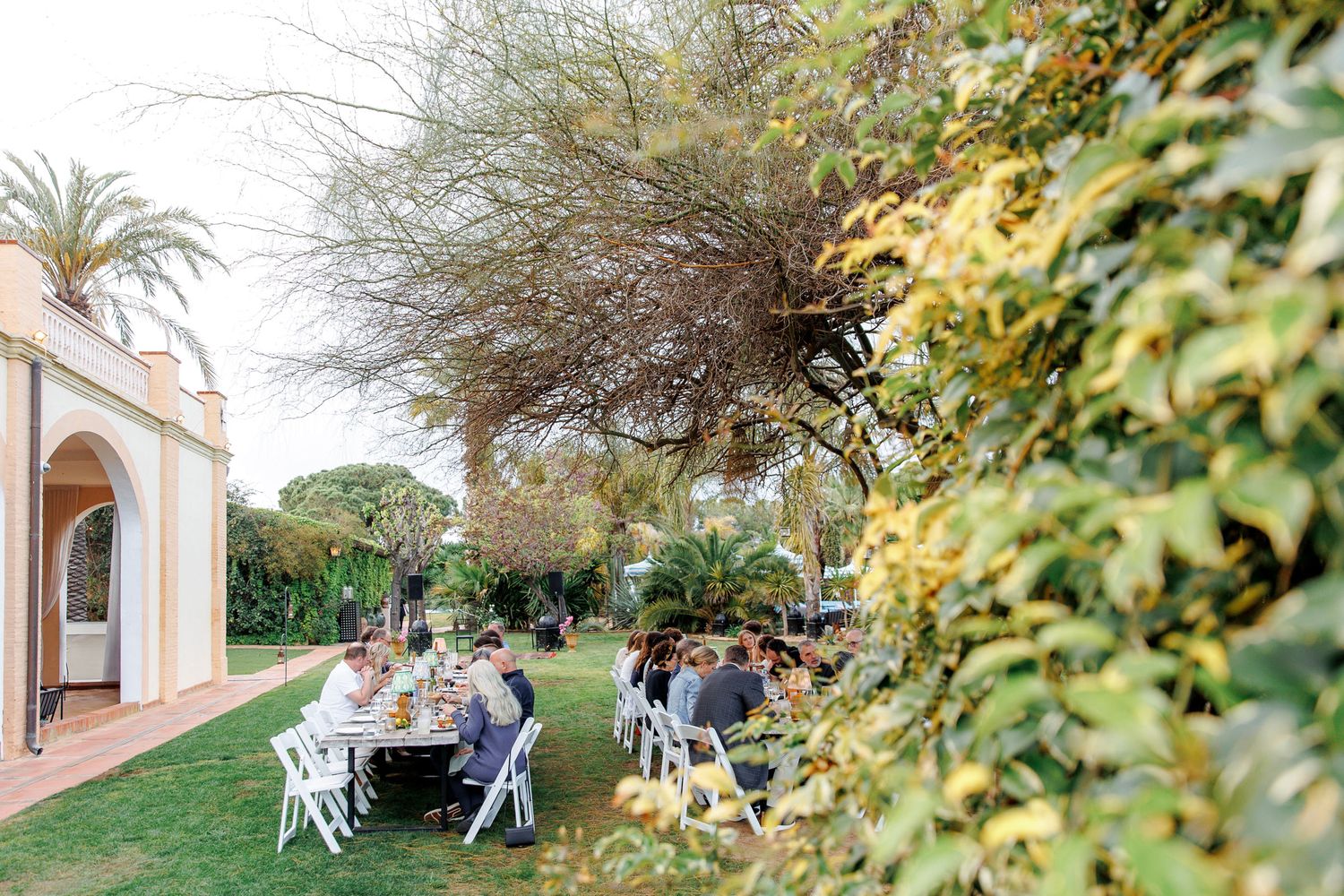Guests enjoy a rehearsal dinner at Gran Villa Rosa, Sitges