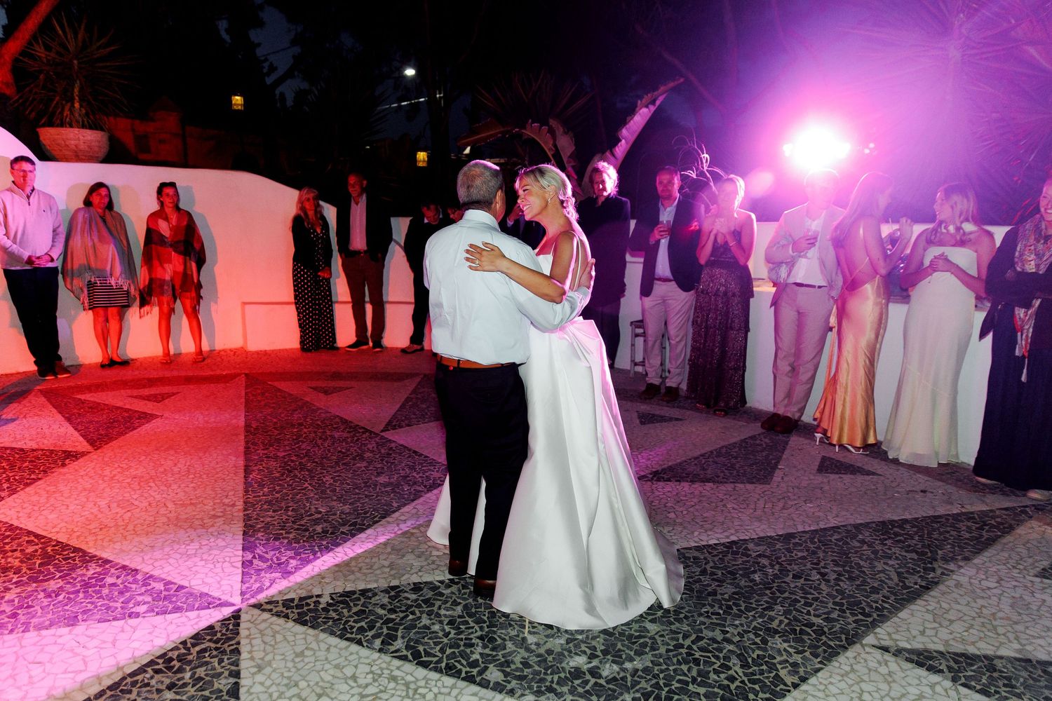 An emotional dance of the bride and her father during her wedding in Spain