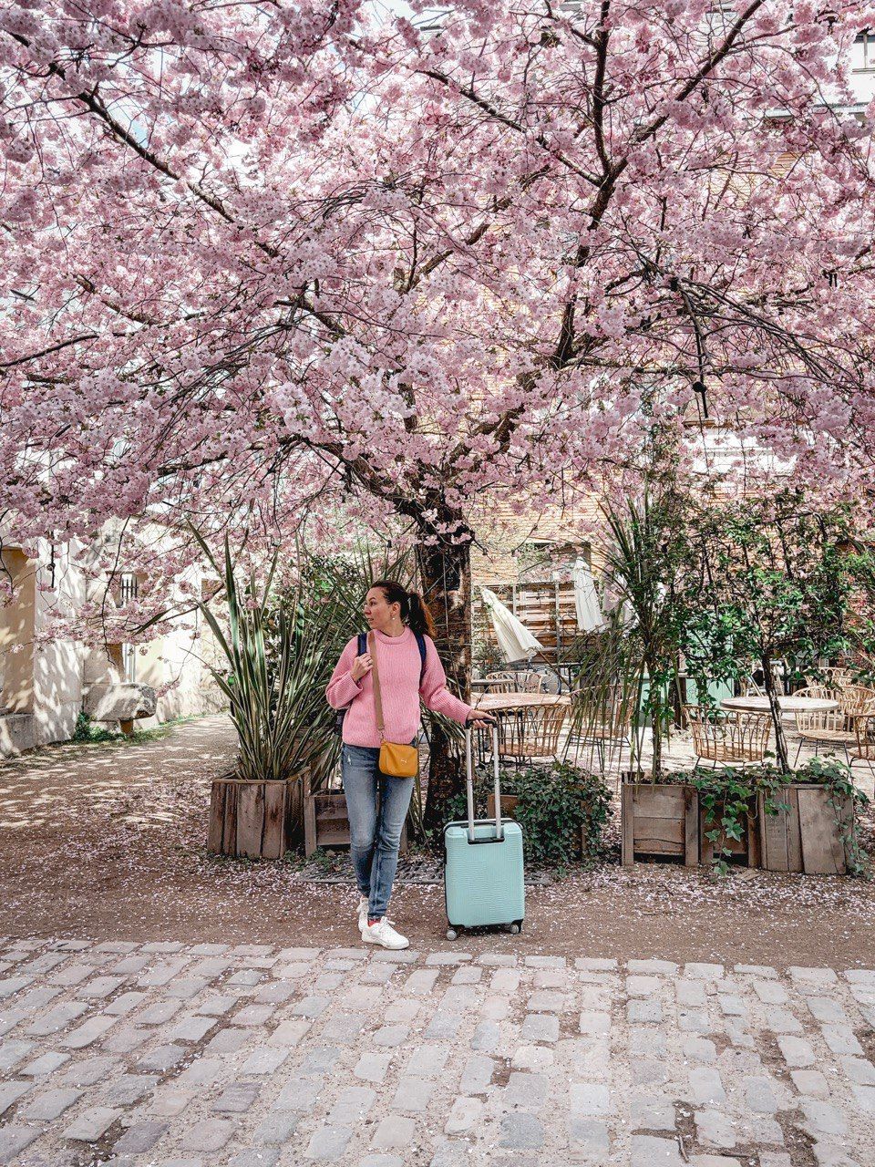 A casual portrait of a destination wedding photographer in Barcelona