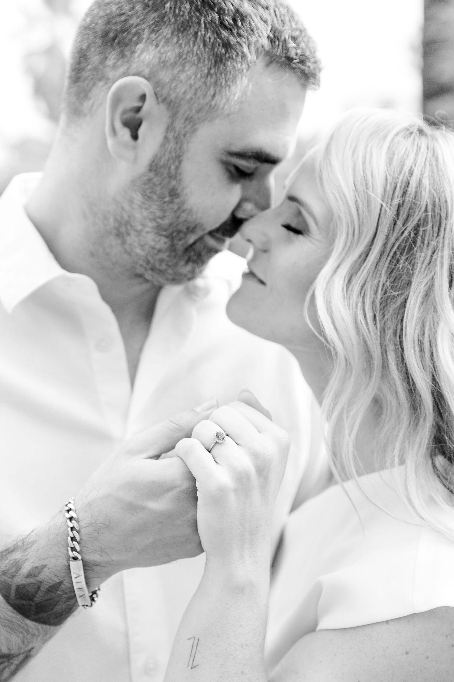 Editorial portrait of a couple during their engagement shoot in Barcelona, Spain, showcasing the engagement ring