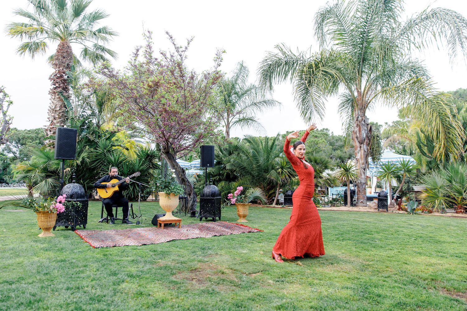 A dancer performing a flamenco dance on a rehearsal dinner in Barcelona.