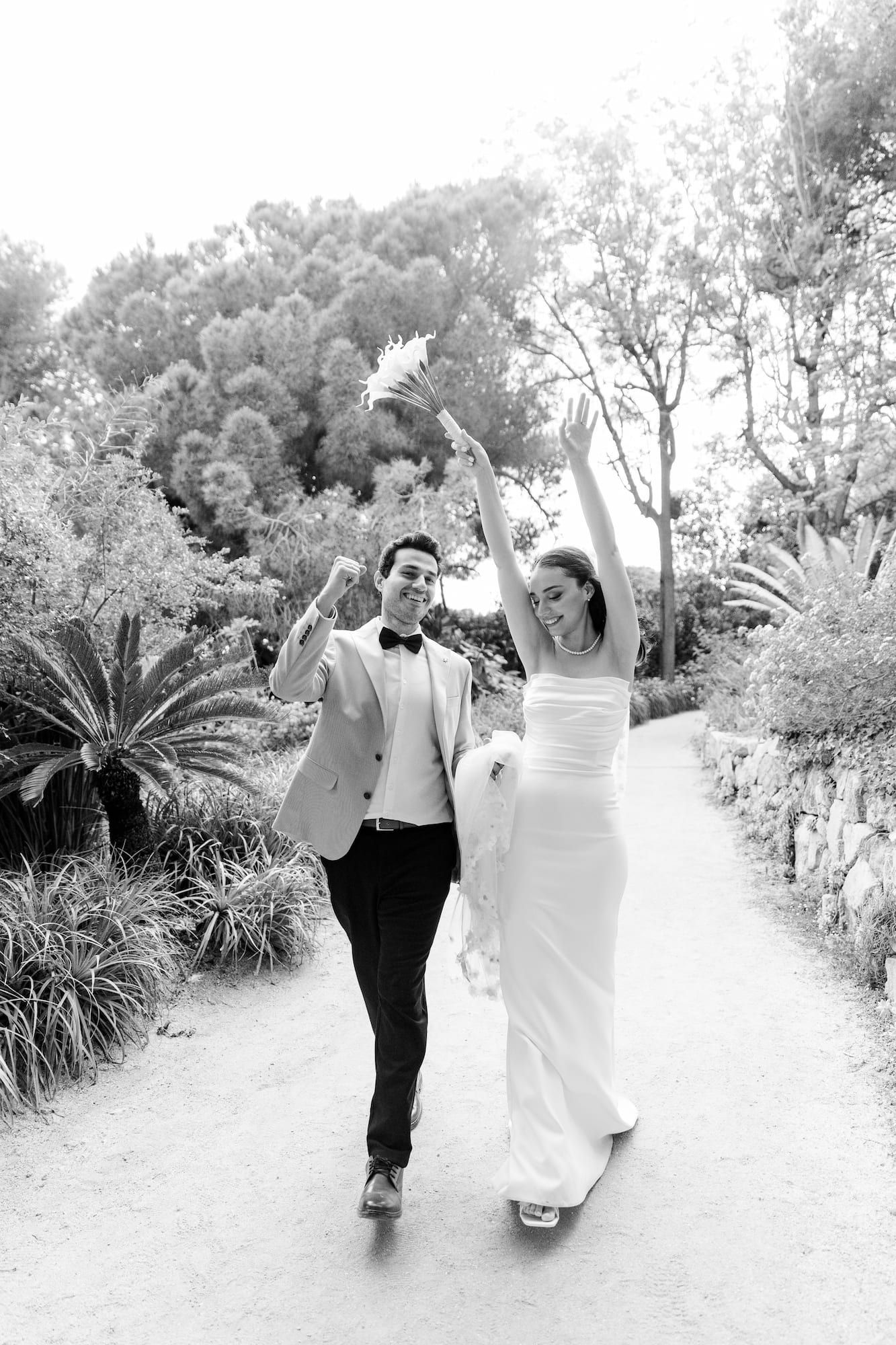 A couple exploring Marimurtra Botanical Garden during an engagement shoot in Barcelona