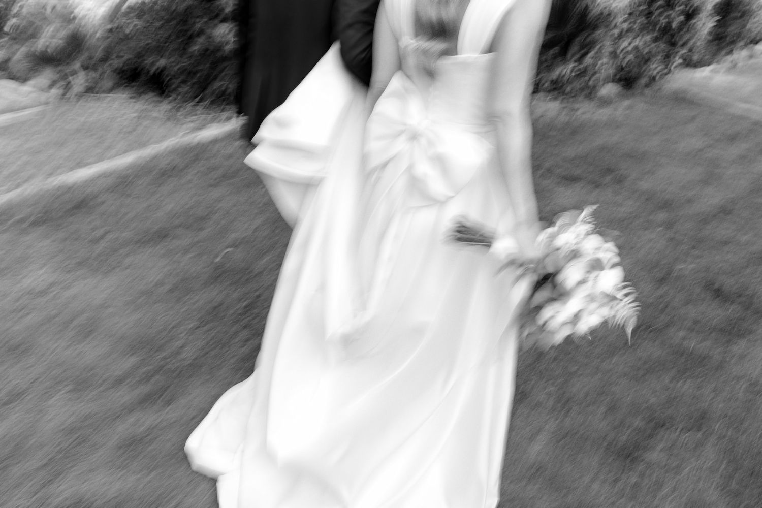 Editorial shoot in black and white of a bride holding the bouquet.