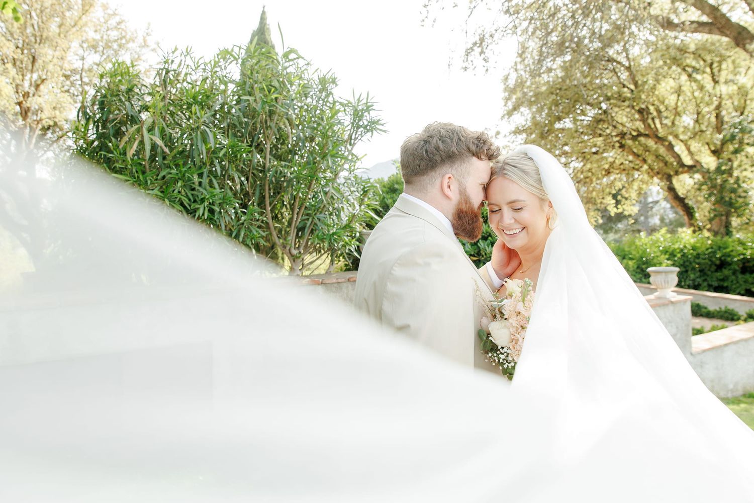 Bride and groom share an intimate moment during their wedding in Barcelona