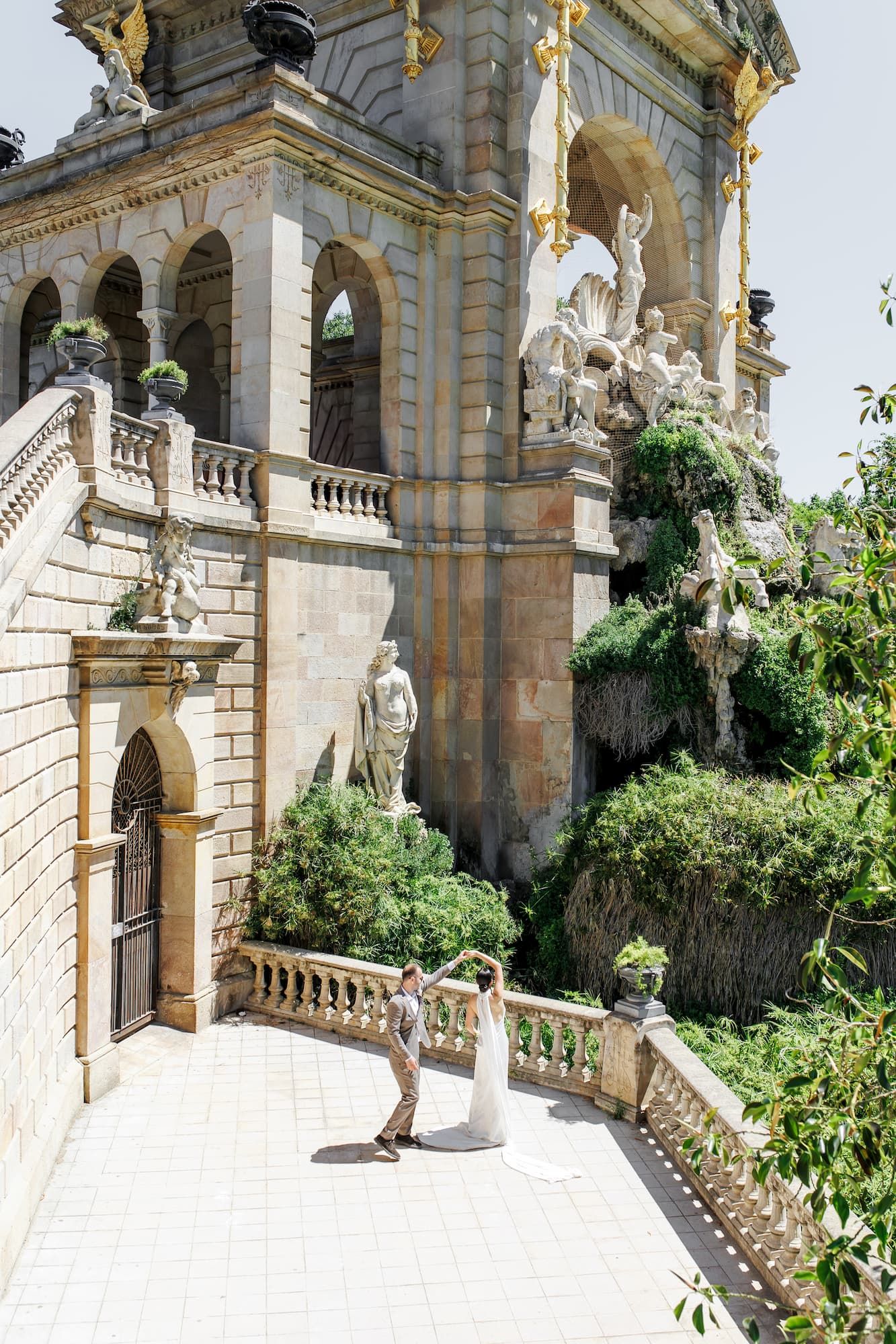Ornate stone balcony with classical architectural details and statues at Ciutadella Park in Barcelona