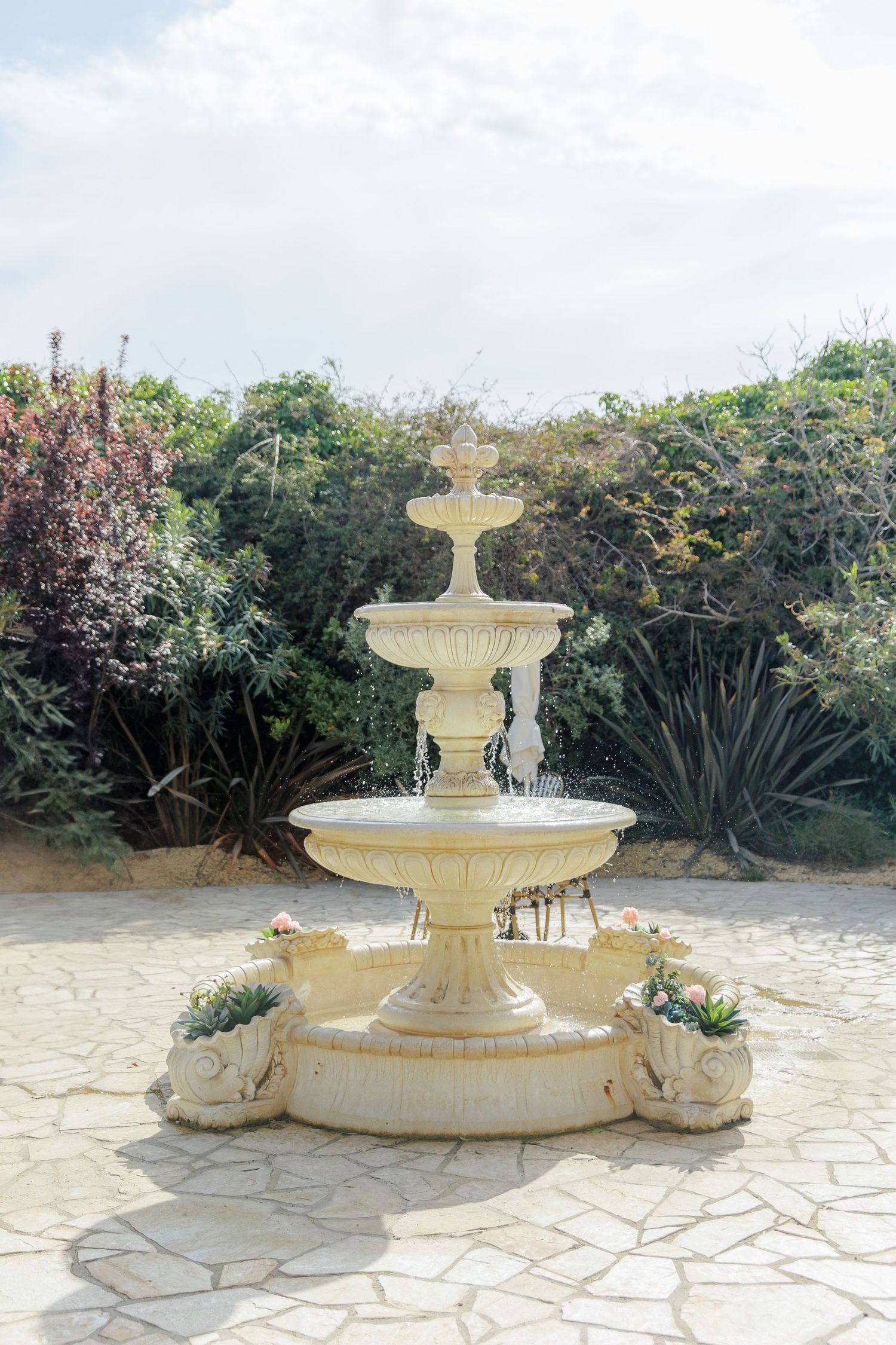 Fountain in the garden of an elegant wedding venue in Barcelona