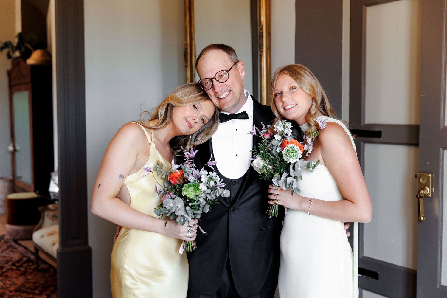 Father and his two daughters before the wedding ceremony starts