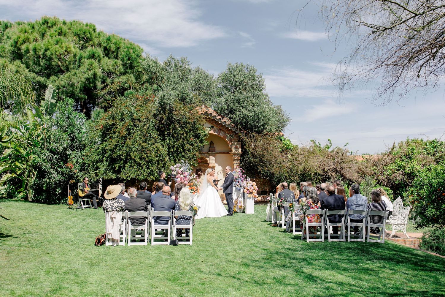 Wedding ceremony in Gran Villa Rosa with the couple in the middle and all the guests gathered around
