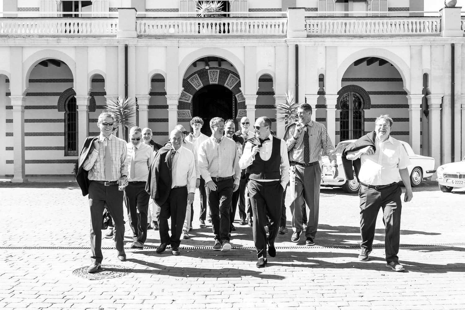 A photo of the room and his friends in black and white tones