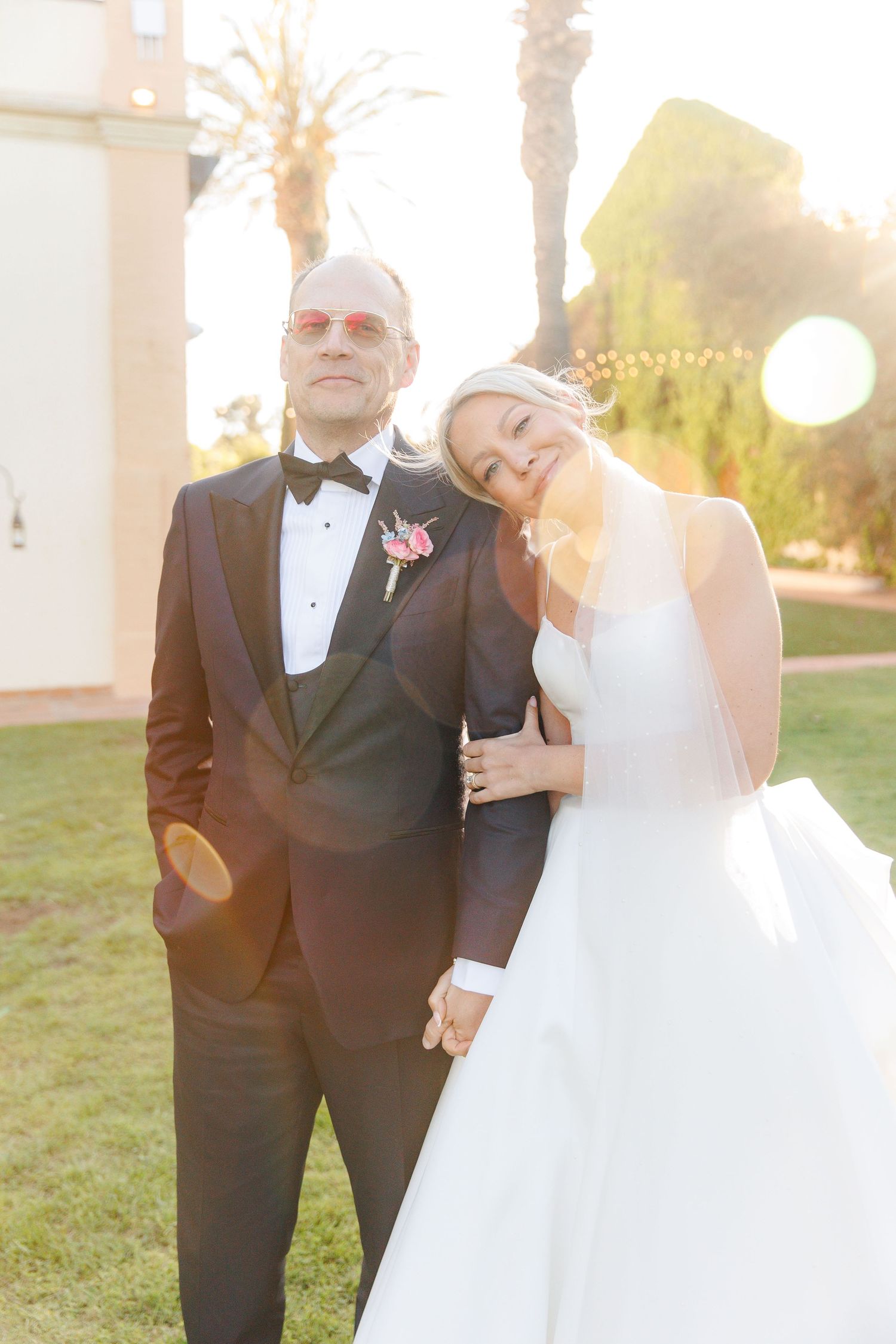 Classical portrait of an American couple during the golden hour at their wedding in Spain