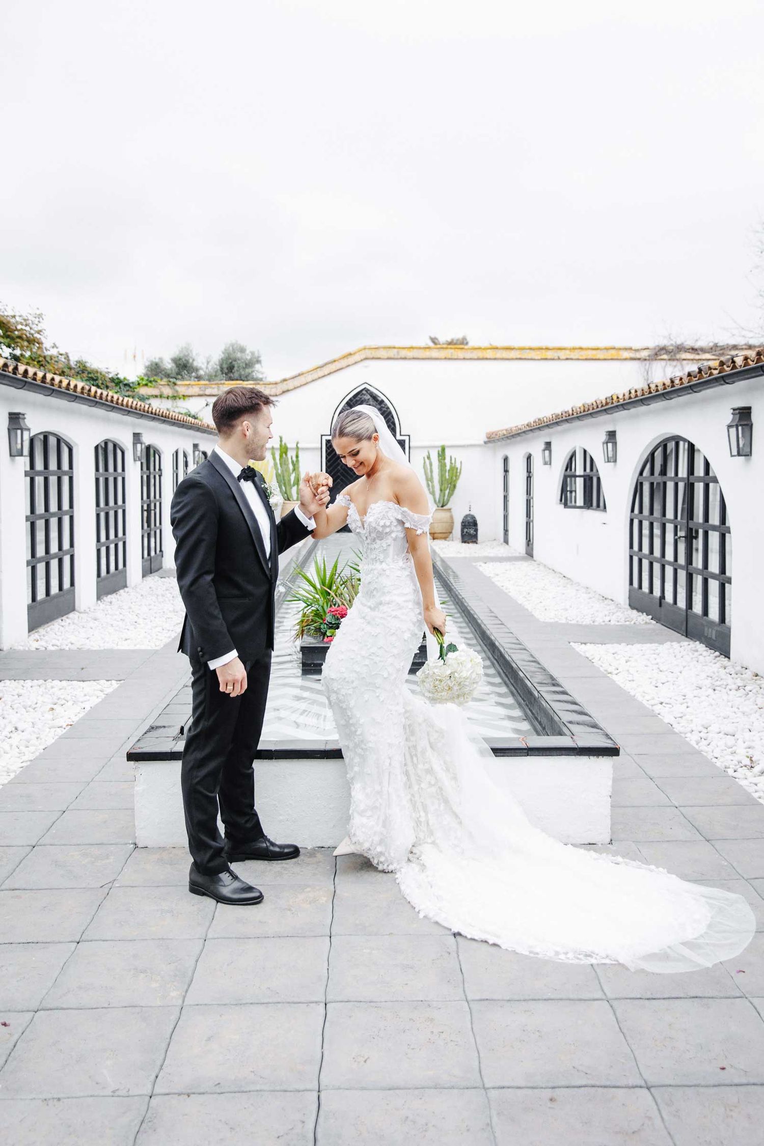 Artistic portrait of the bride and groom, highlighting their love in Barcelona