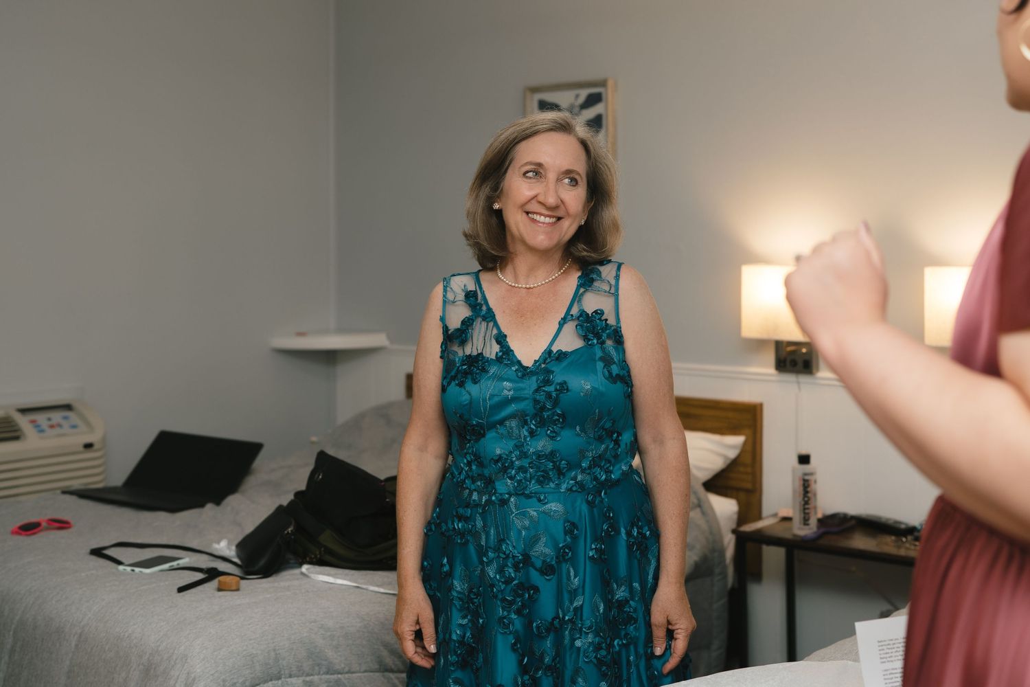 Getting ready scene in bright indoor room with natural lighting.