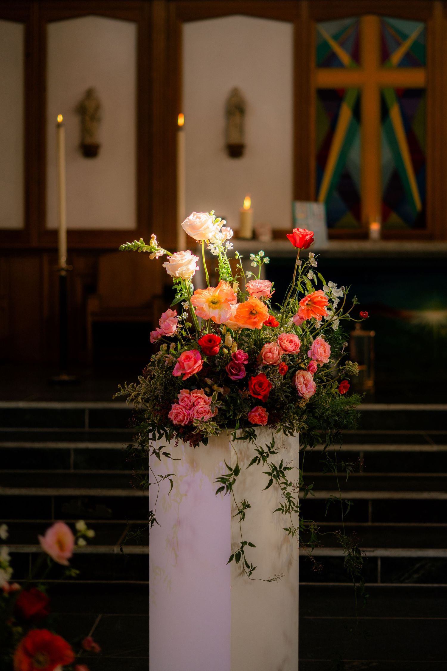Beautiful floral arrangement in Penzance Church, created by Perdie's Flowers in Cornwall