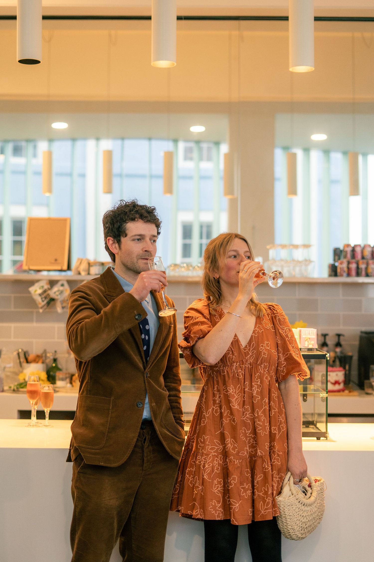 Candid photo of guests drinking at Newlyn Art Gallery & The Exchange in Penzance, Cornwall